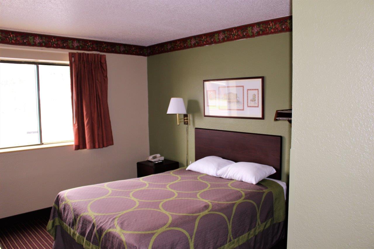 Hotel room with a double bed.