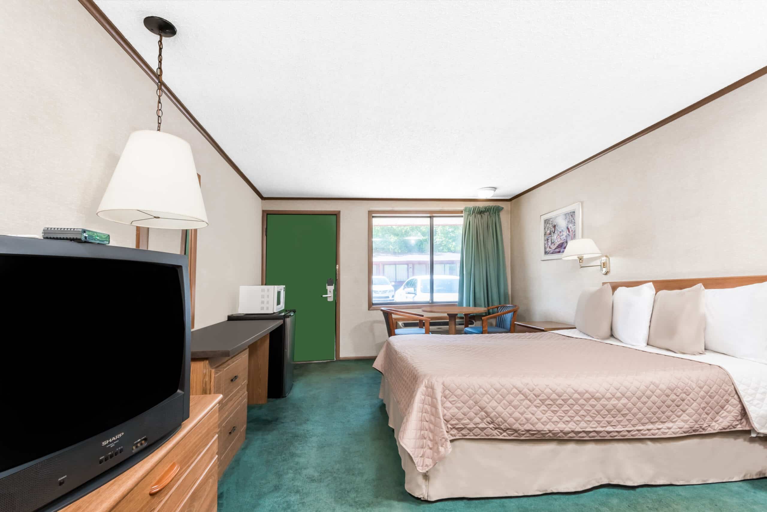 Hotel room with a double bed.
