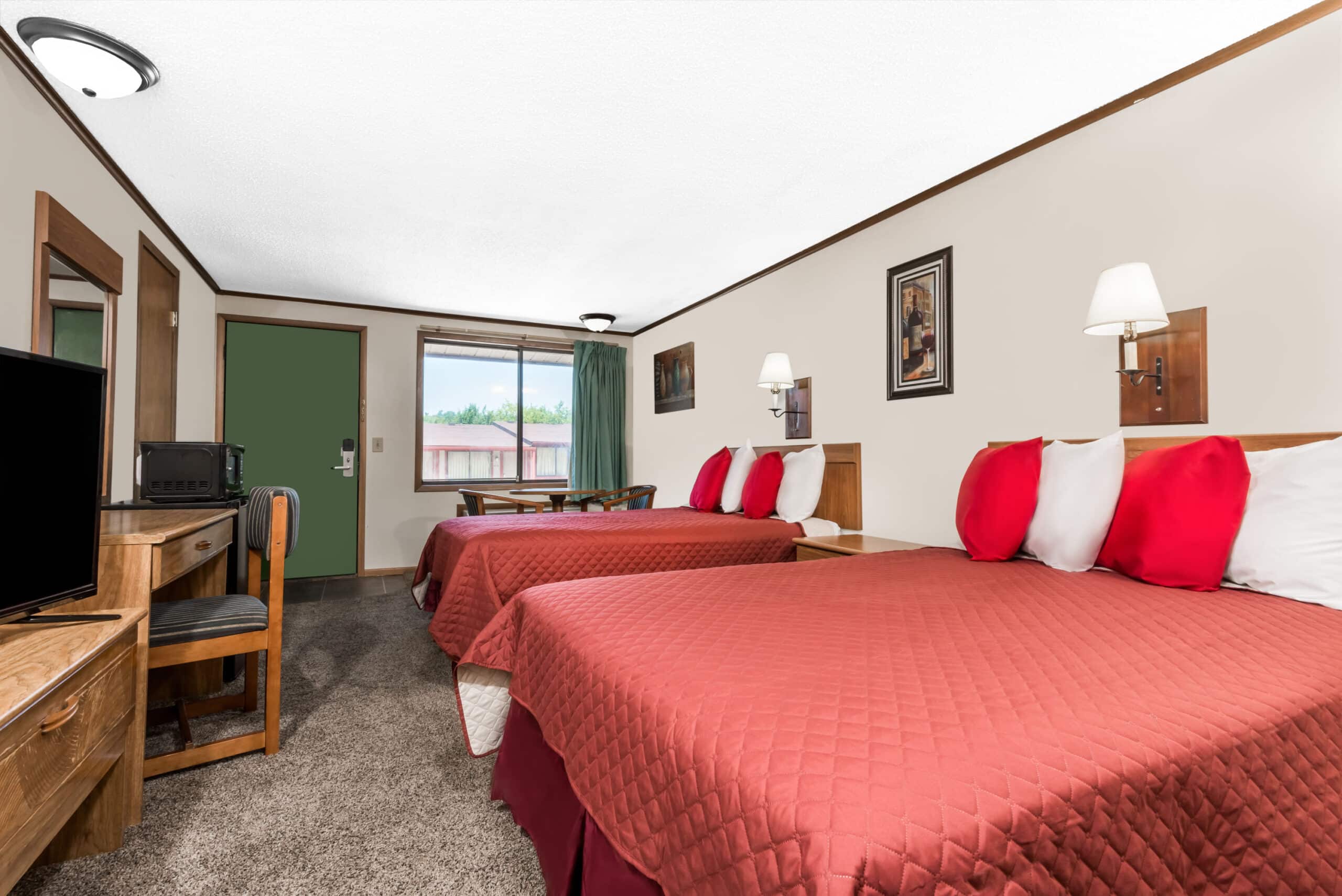 Hotel room with two double beds.