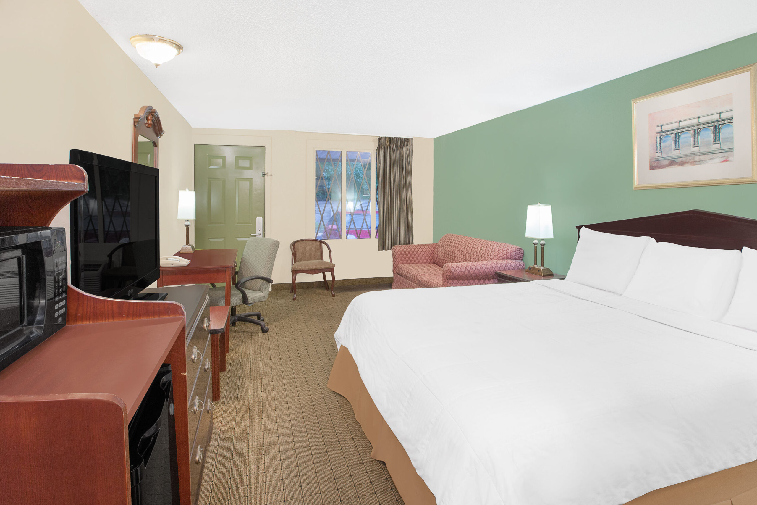 Hotel room with a double bed.