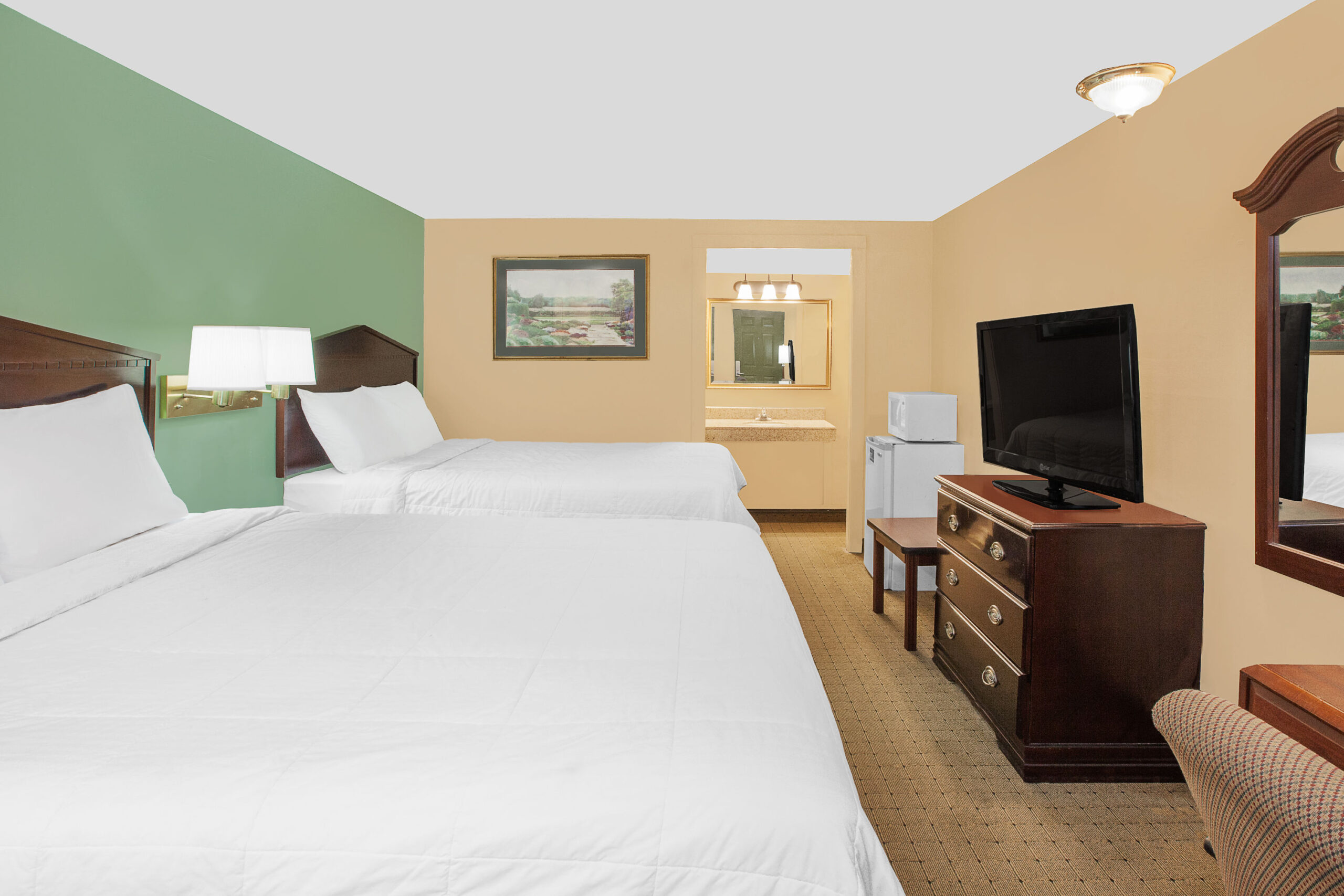 Hotel room with two double beds.