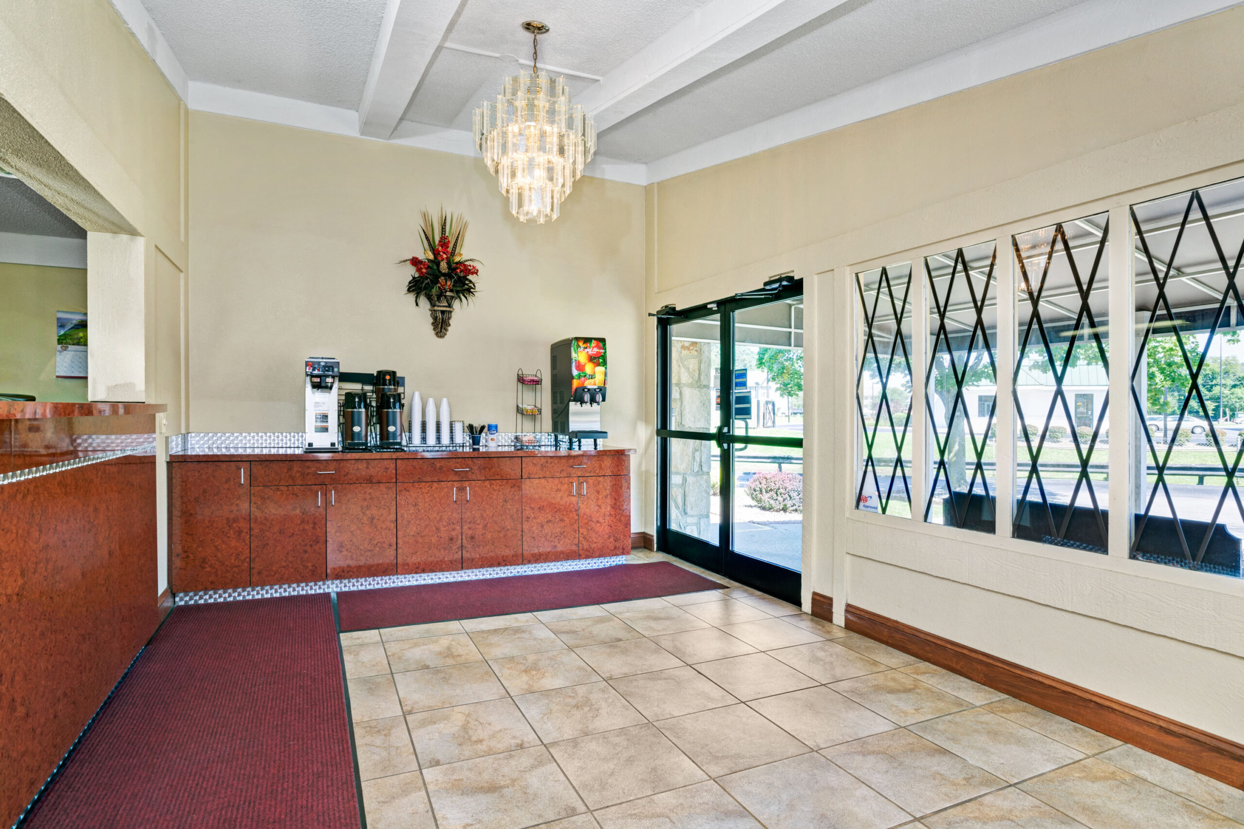 Hotel lobby with coffee station and vending machine.