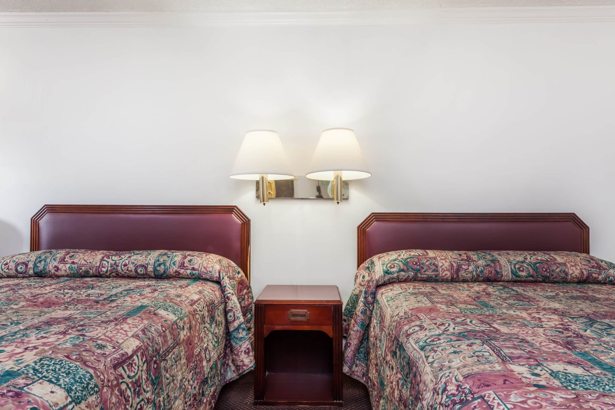 Hotel room with two double beds.