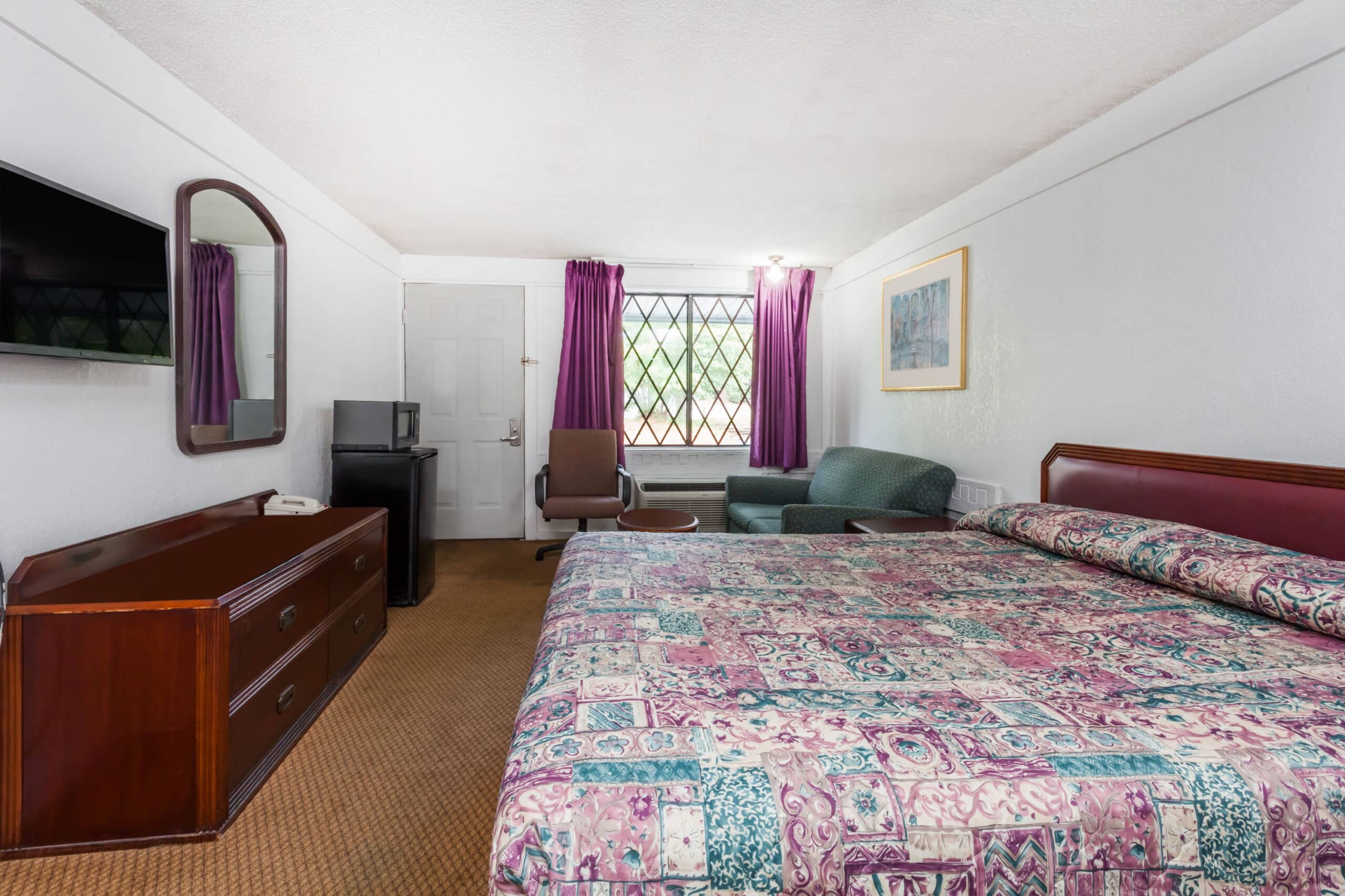 Hotel room with double bed.