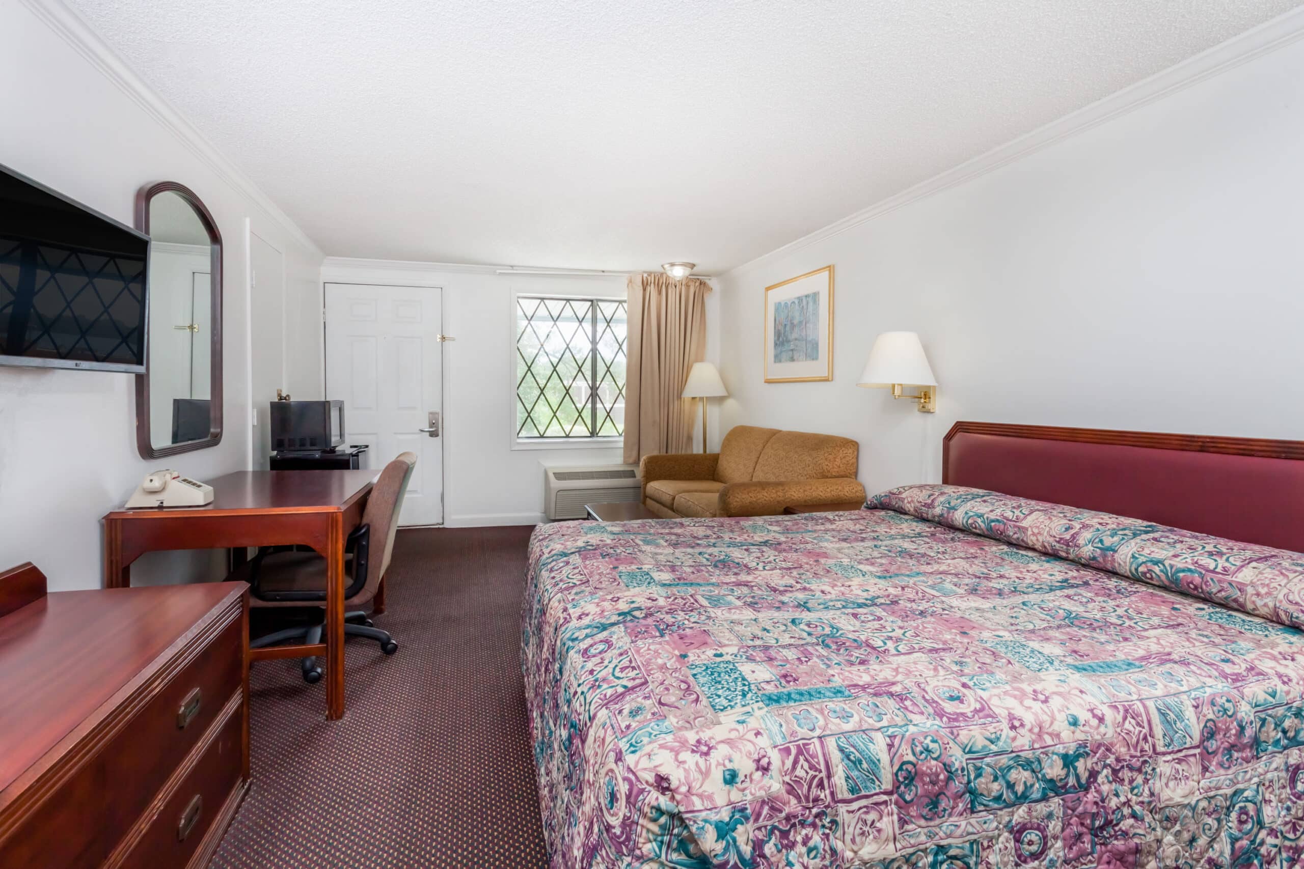 Hotel room with double bed.