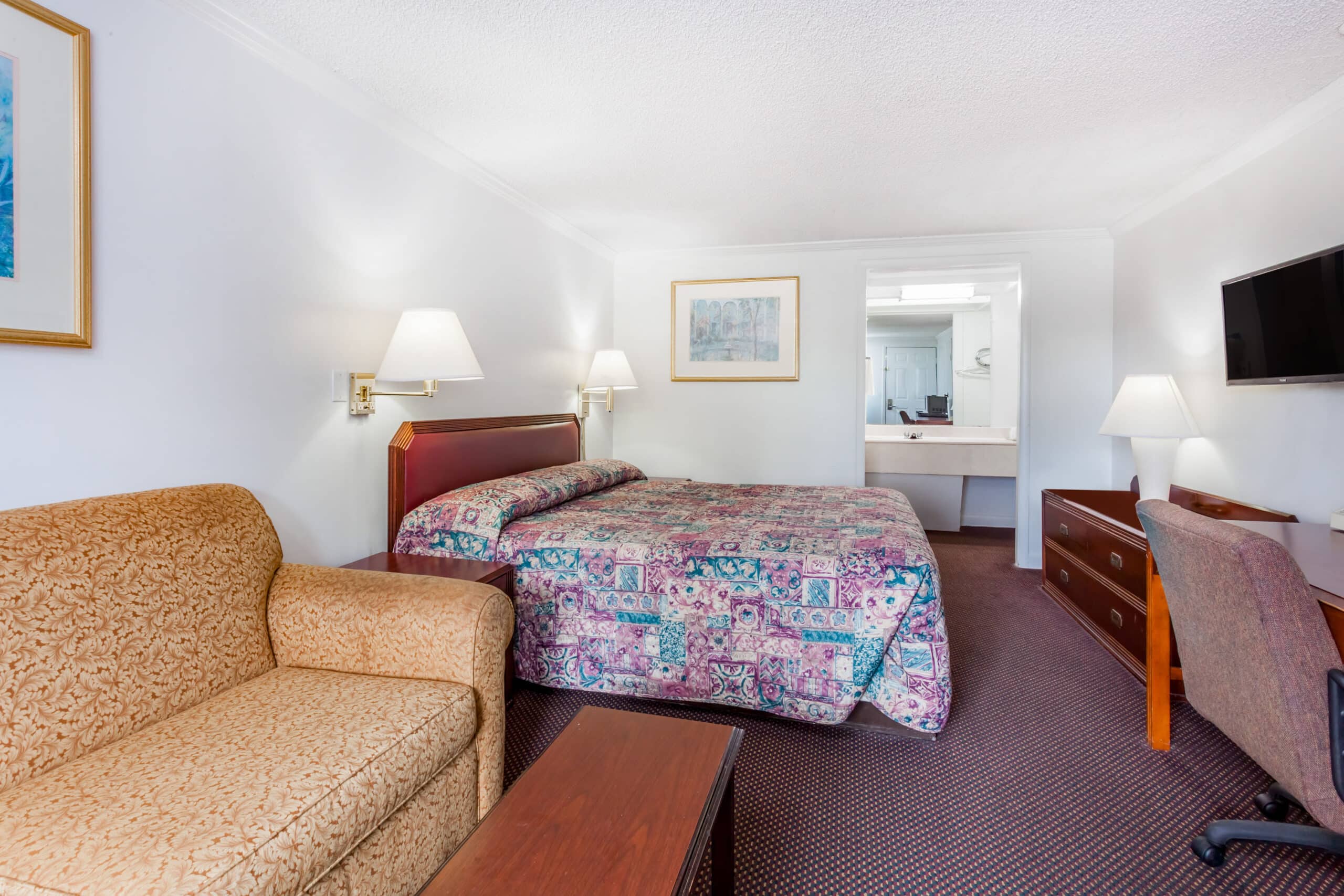 Hotel room with double bed.