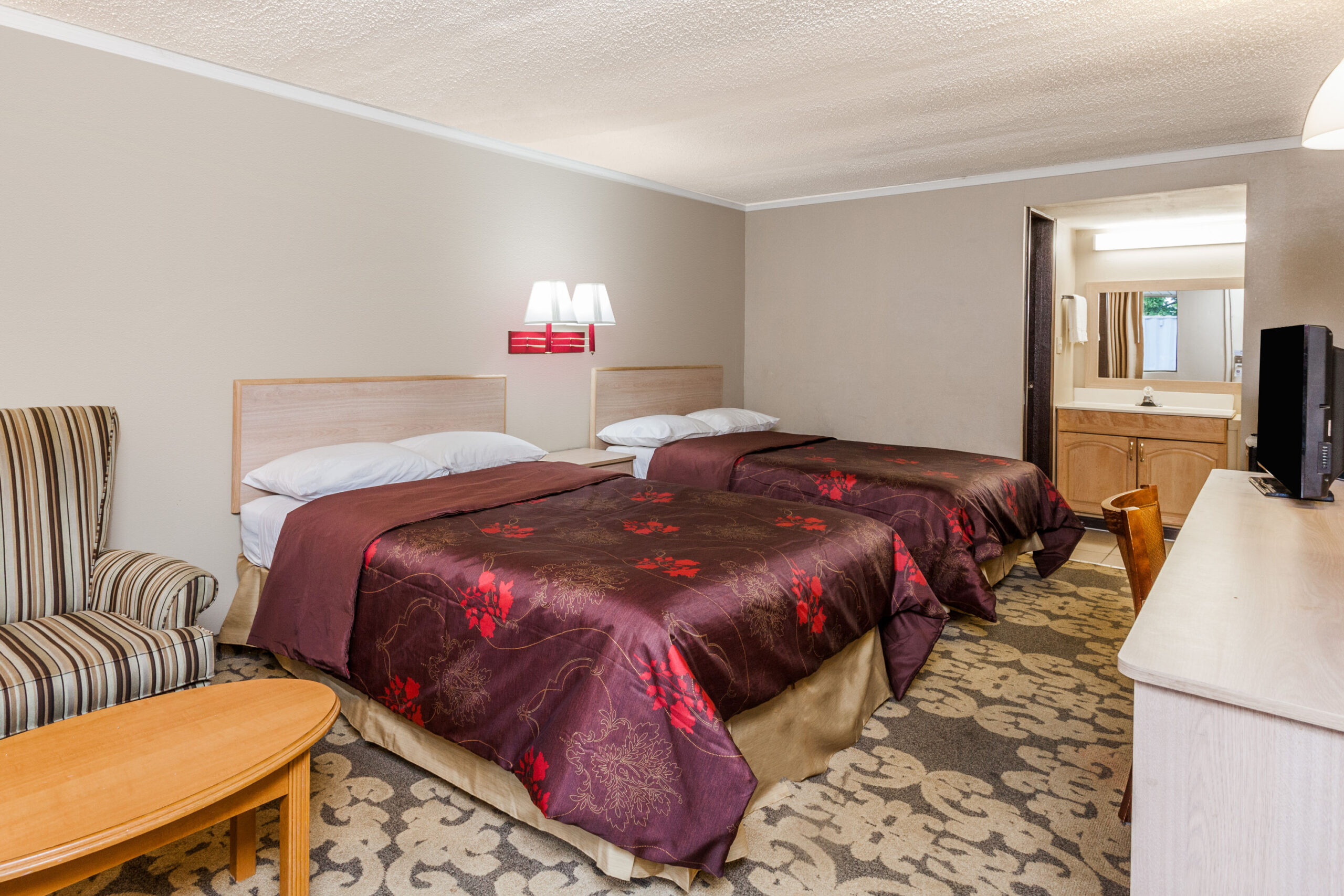 Hotel room with two double beds.