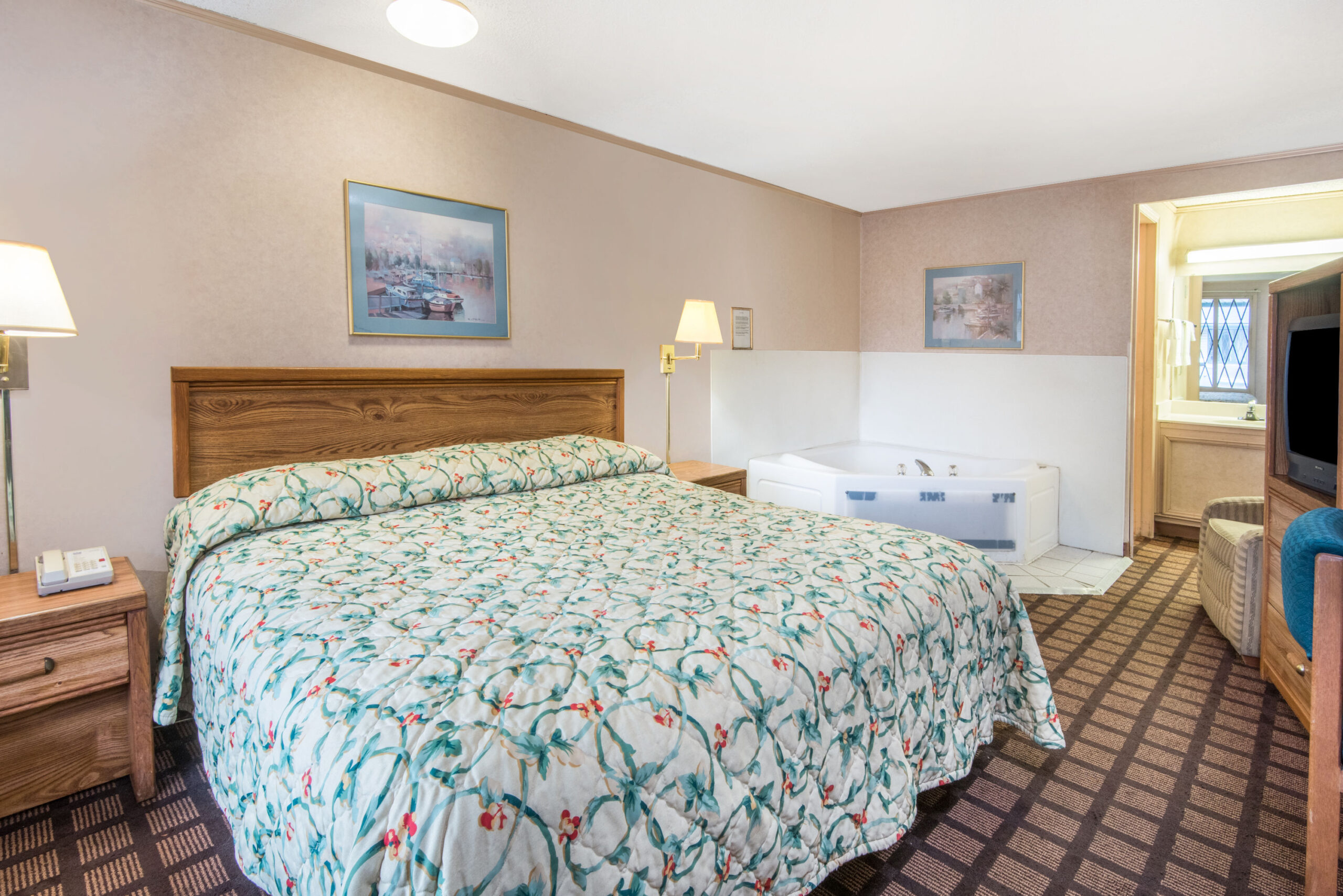 Hotel room with a king bed.