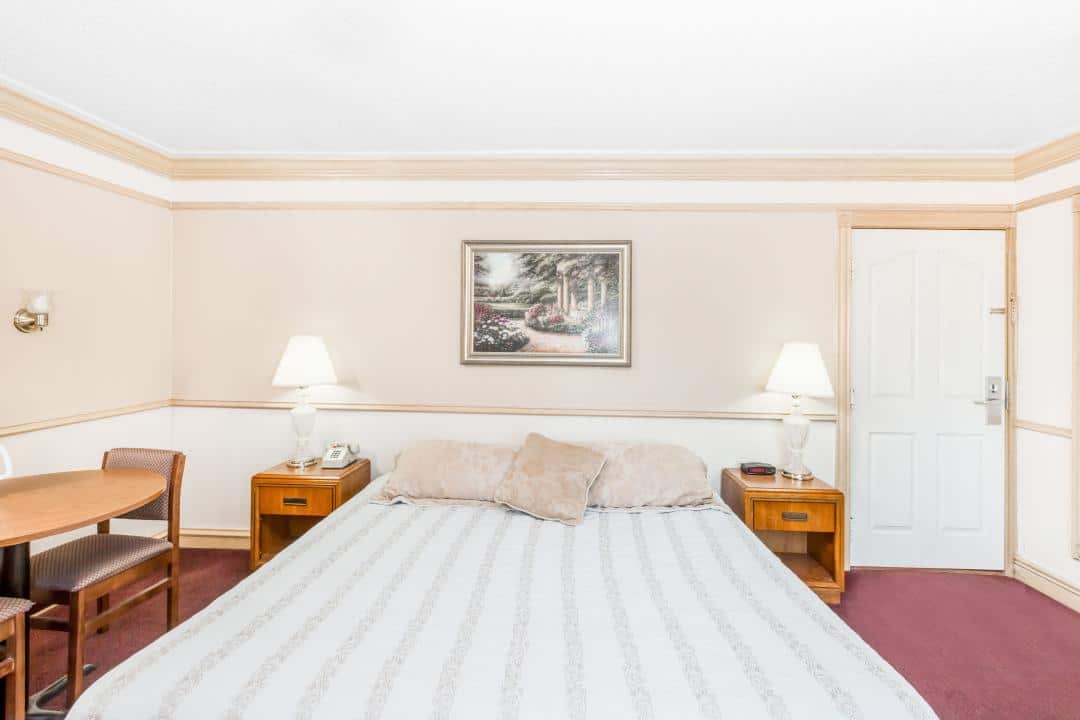 Hotel room with a king bed.