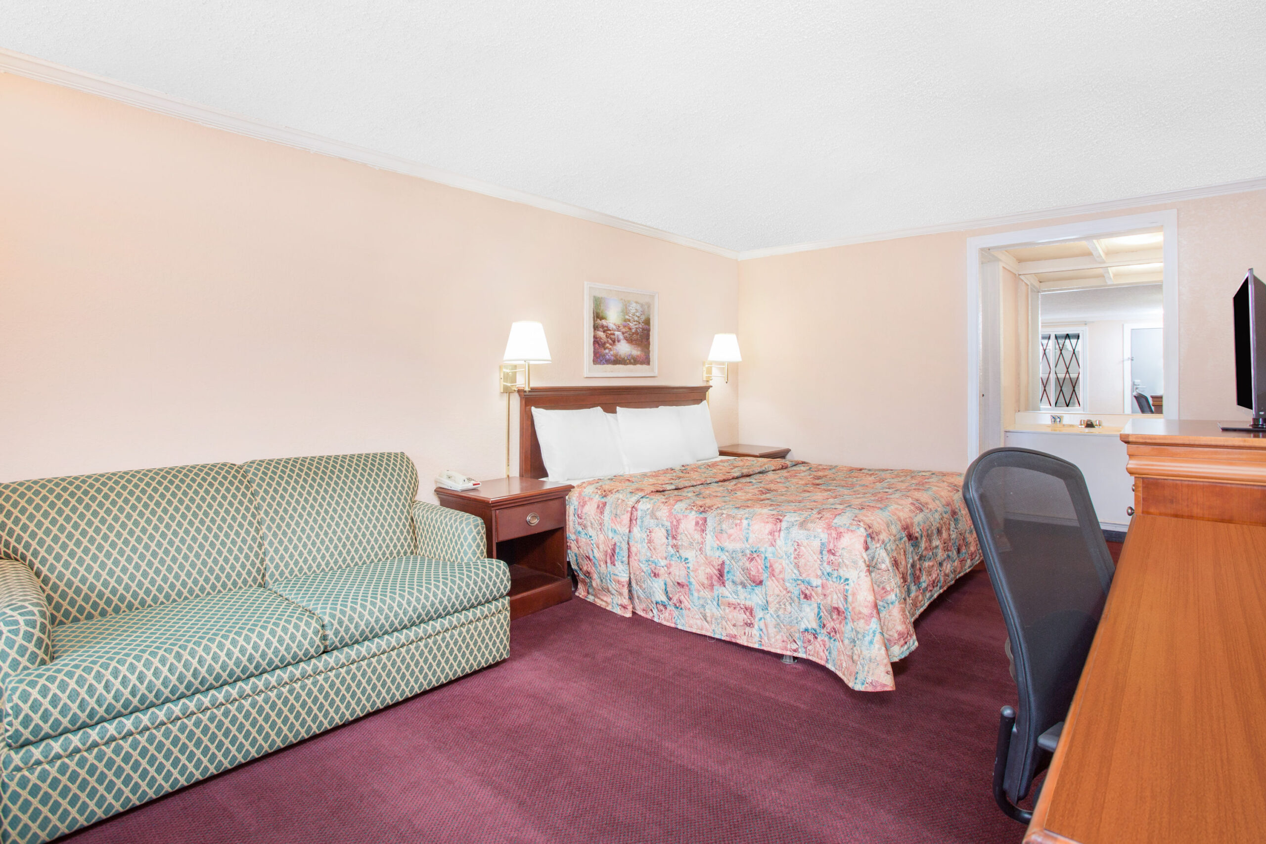 Hotel room with a double bed.