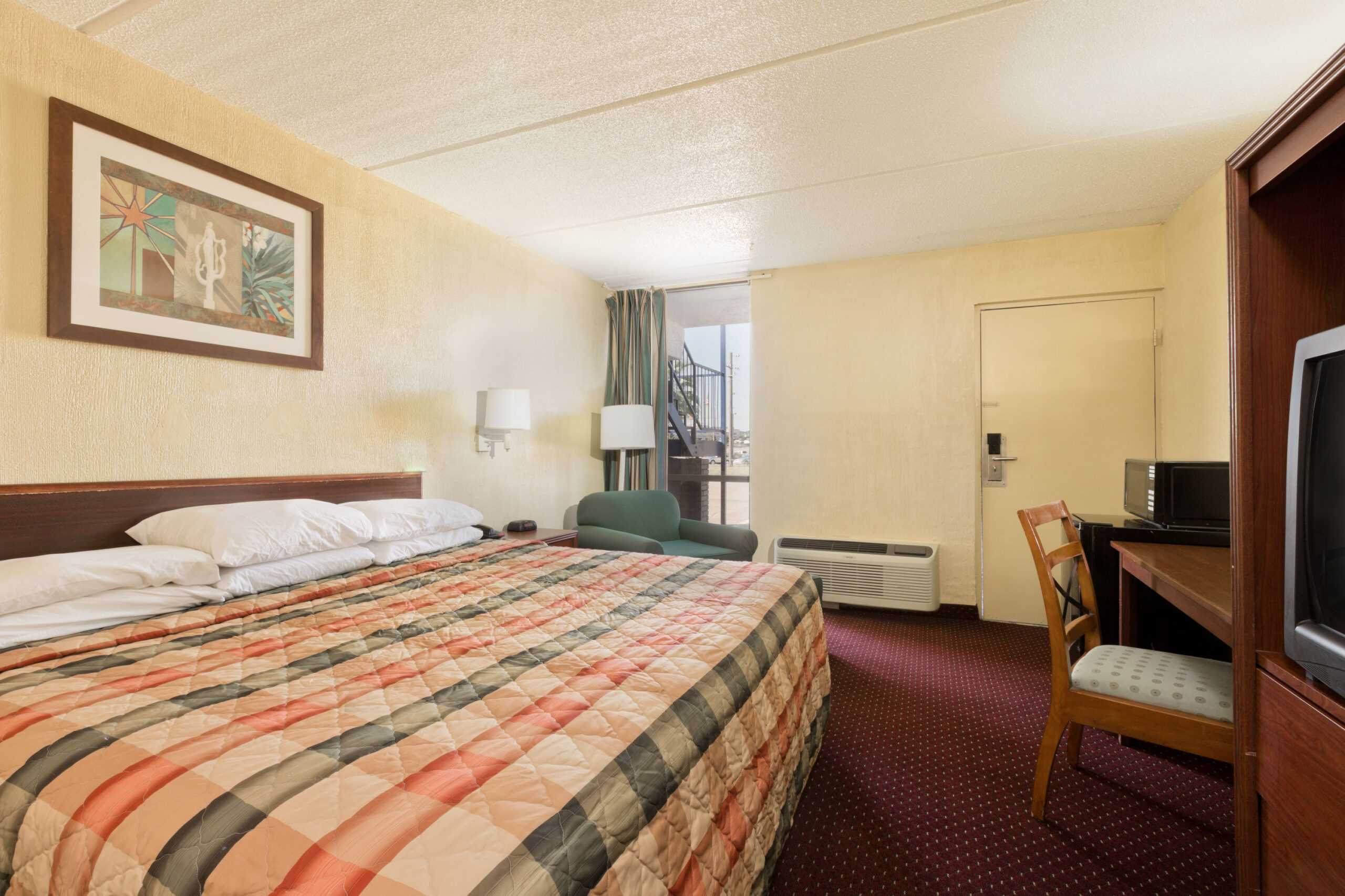 Hotel room with a double bed.