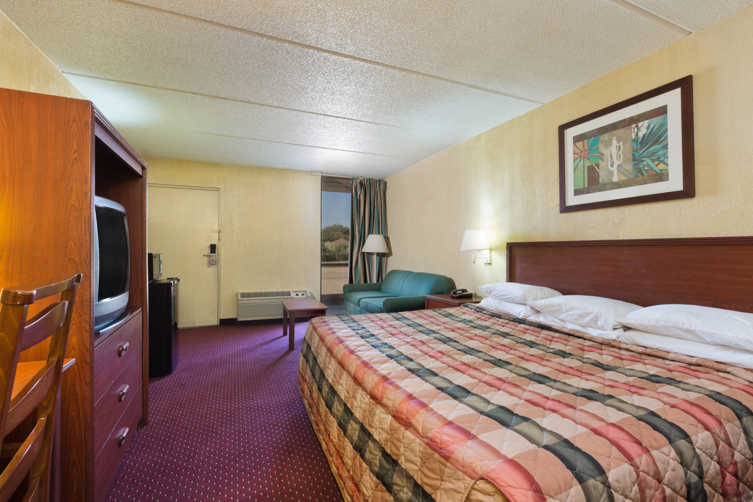 Hotel room with a double bed.
