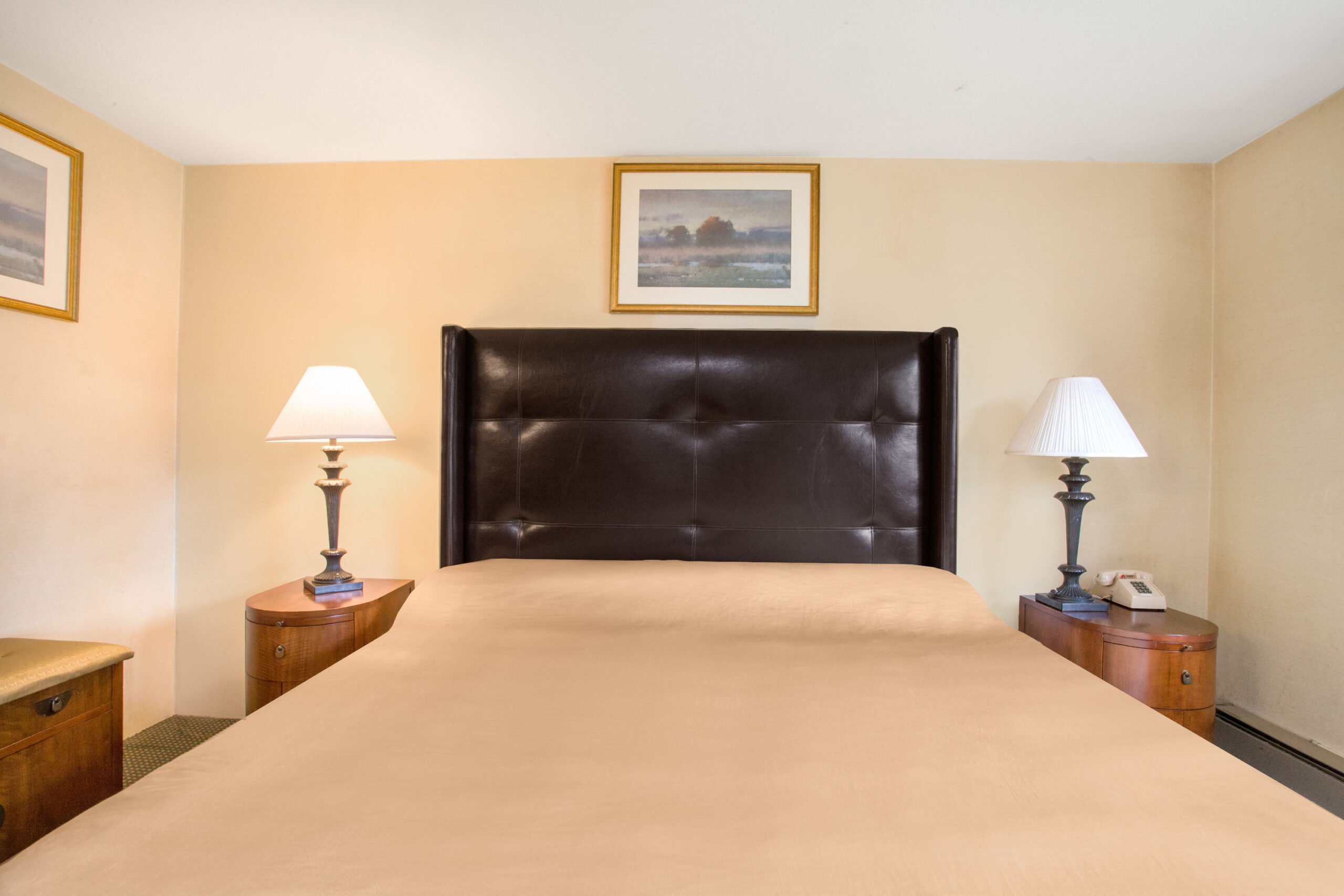 Hotel room with two double beds.