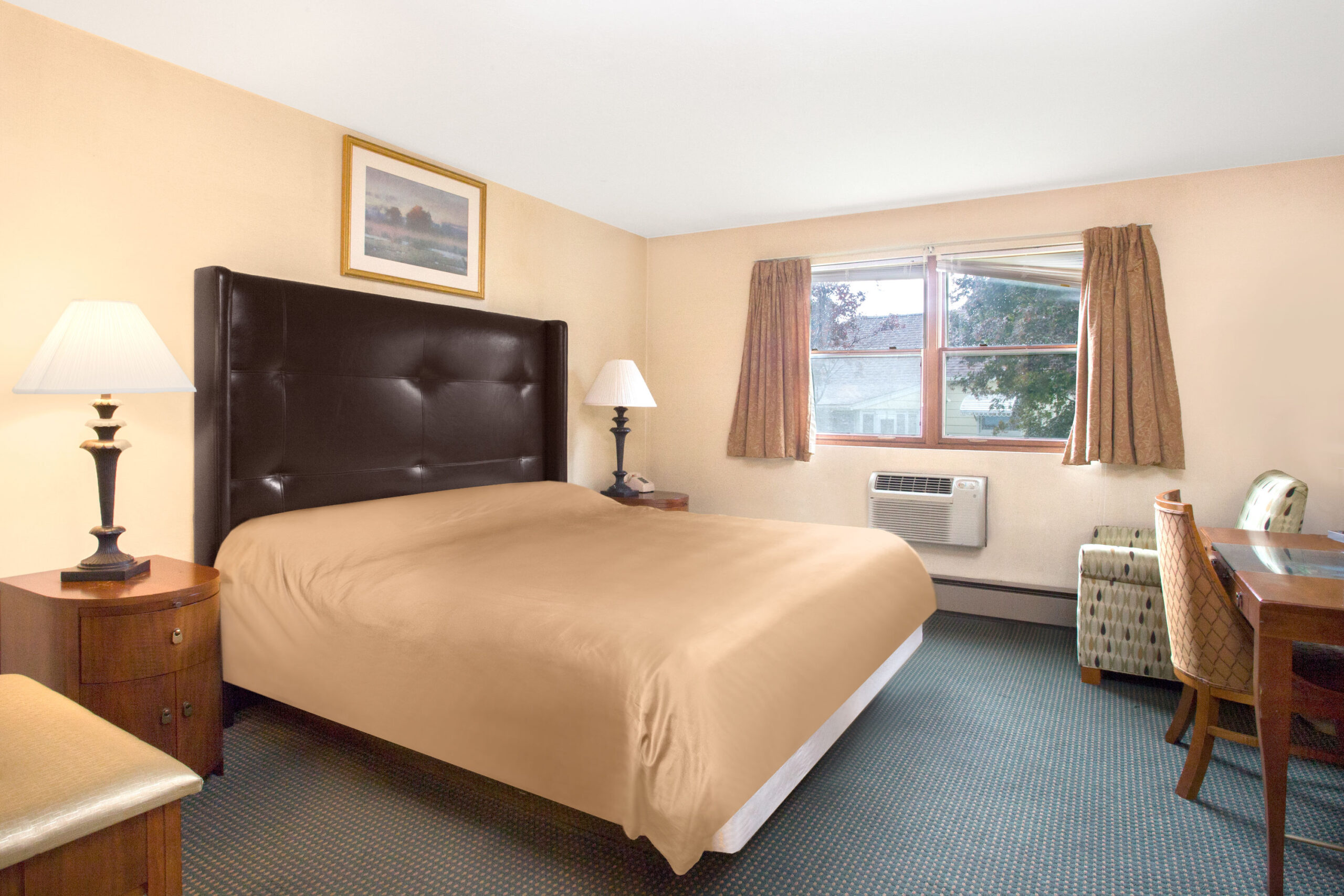 Hotel room with two double beds.