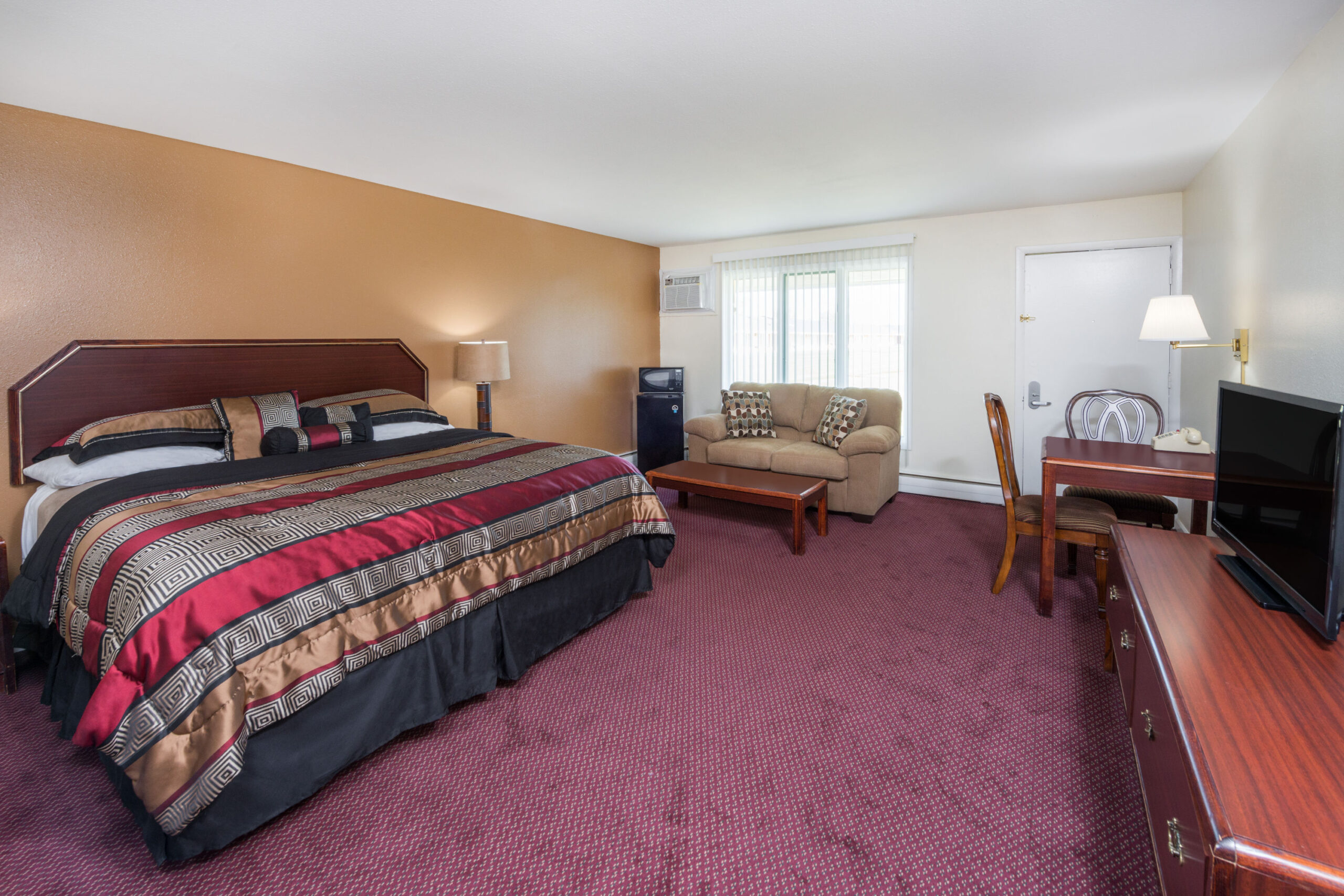 Hotel room with a king bed.