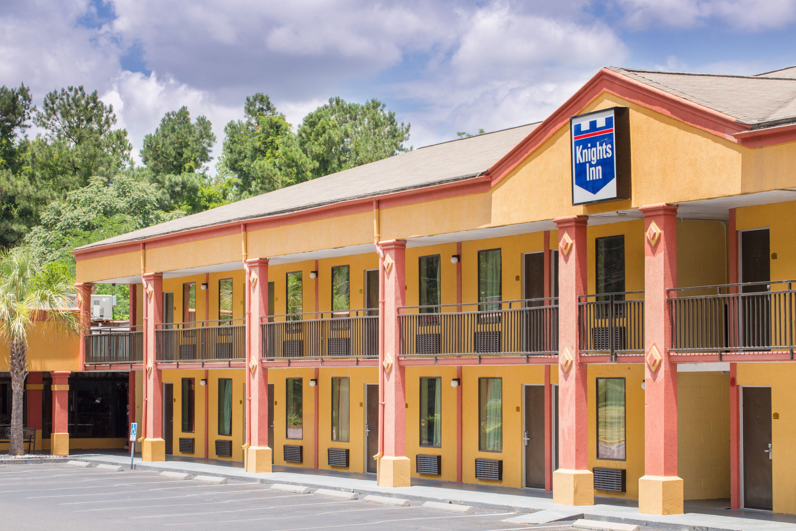 Hotel exterior at noon.