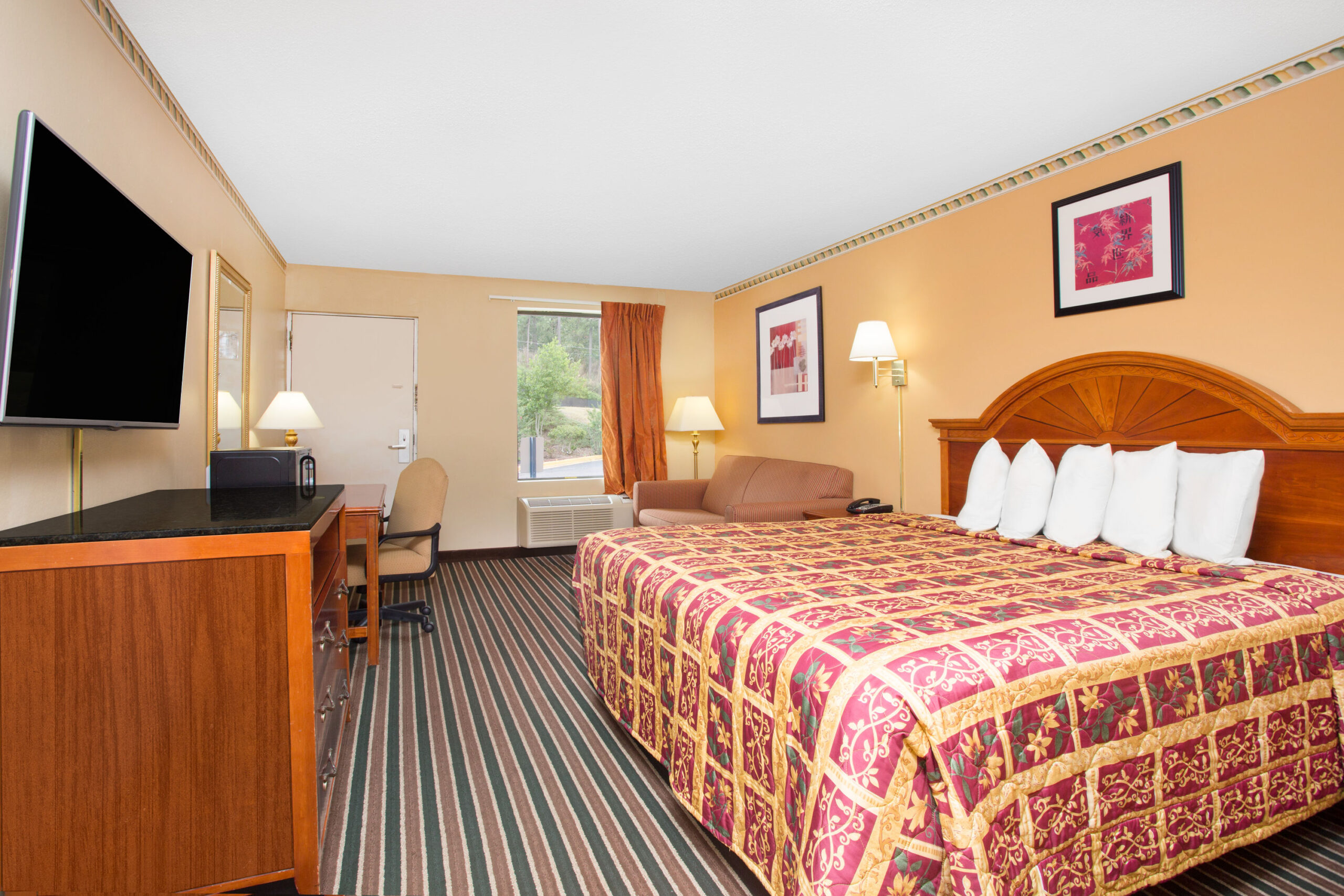 Hotel room with a double bed.