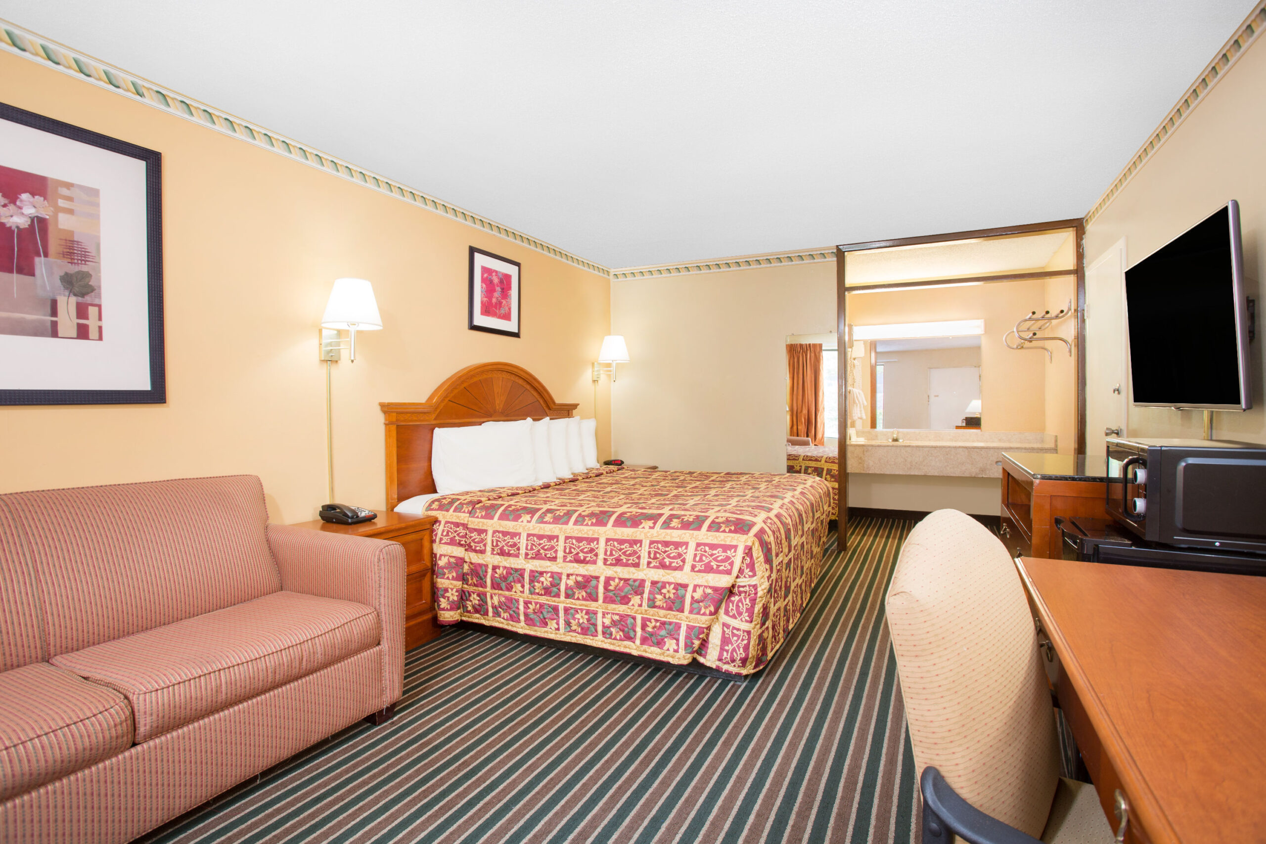 Hotel room with a double bed.
