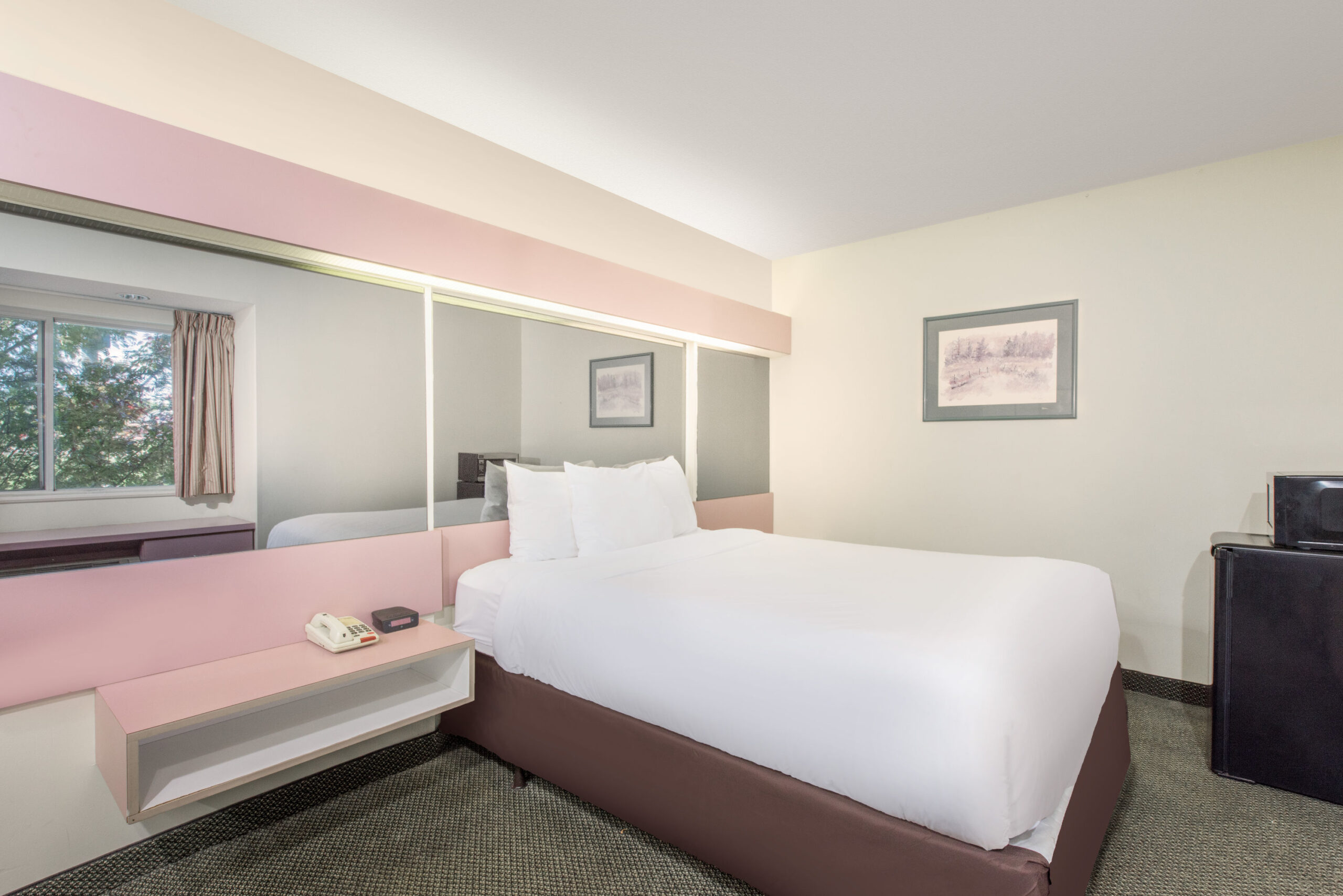 Hotel room with a double bed.