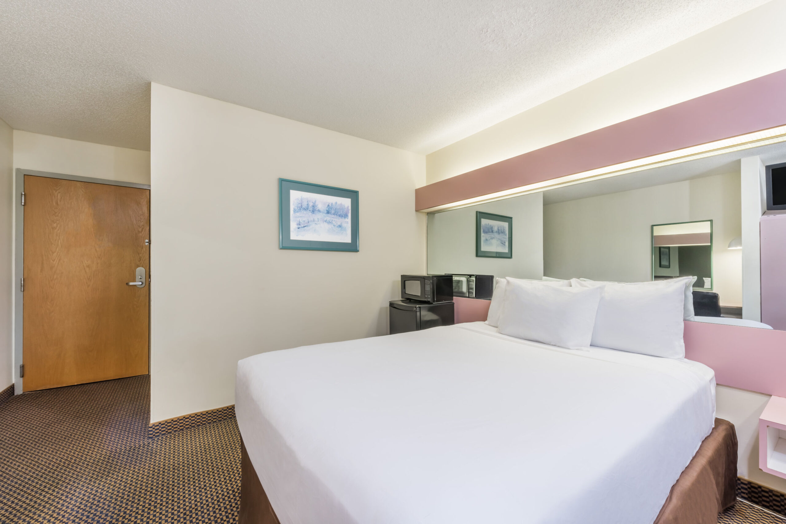 Hotel room with a double bed.