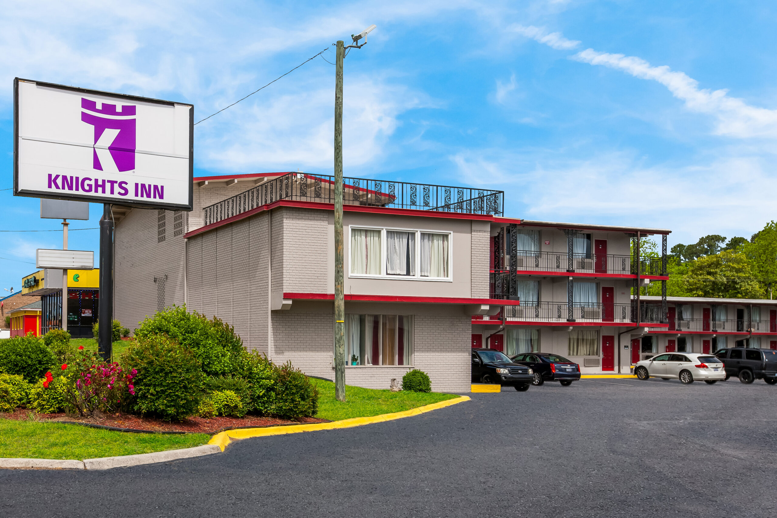 Hotel exterior at noon.