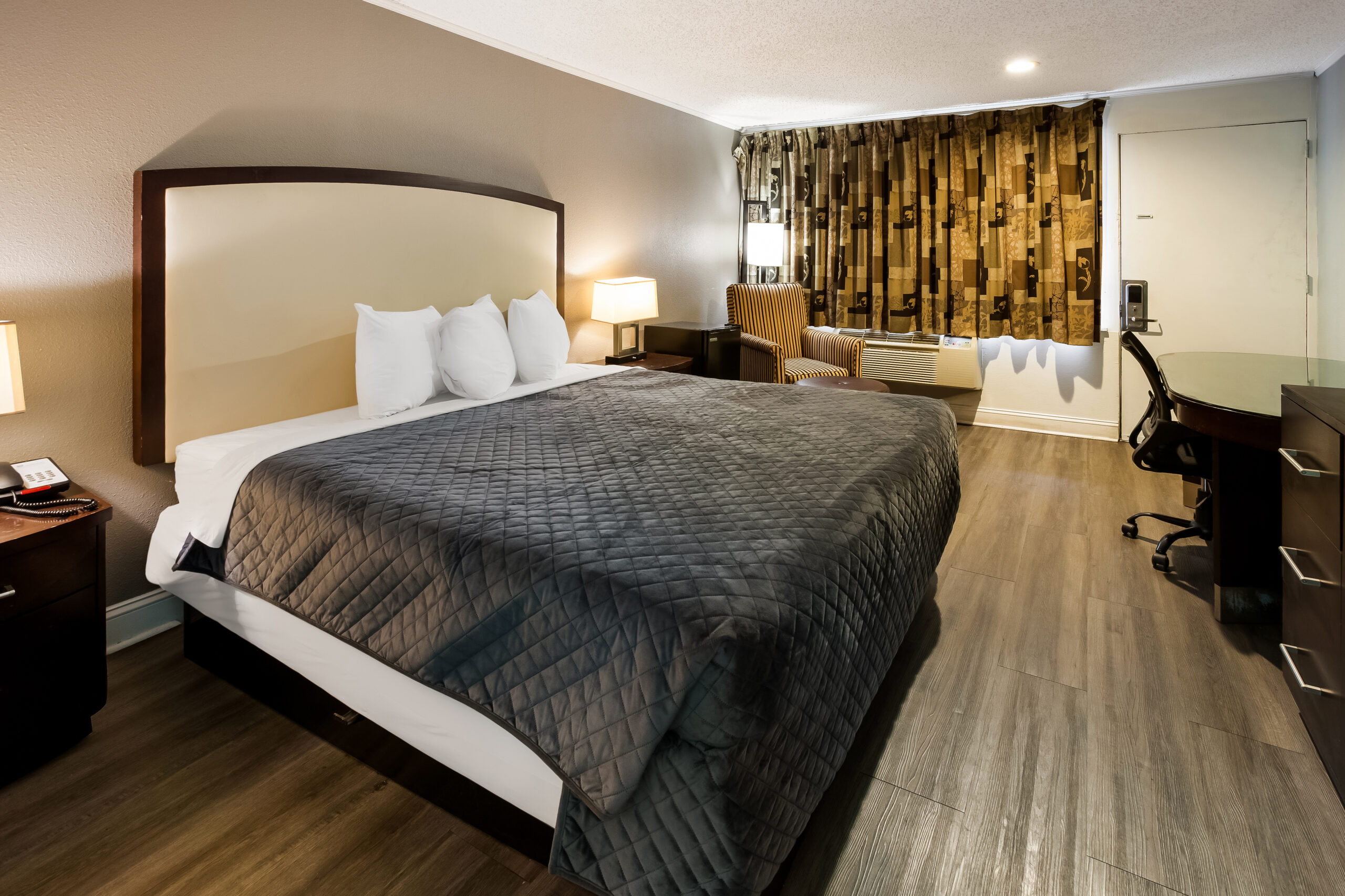 Hotel room with a king bed.