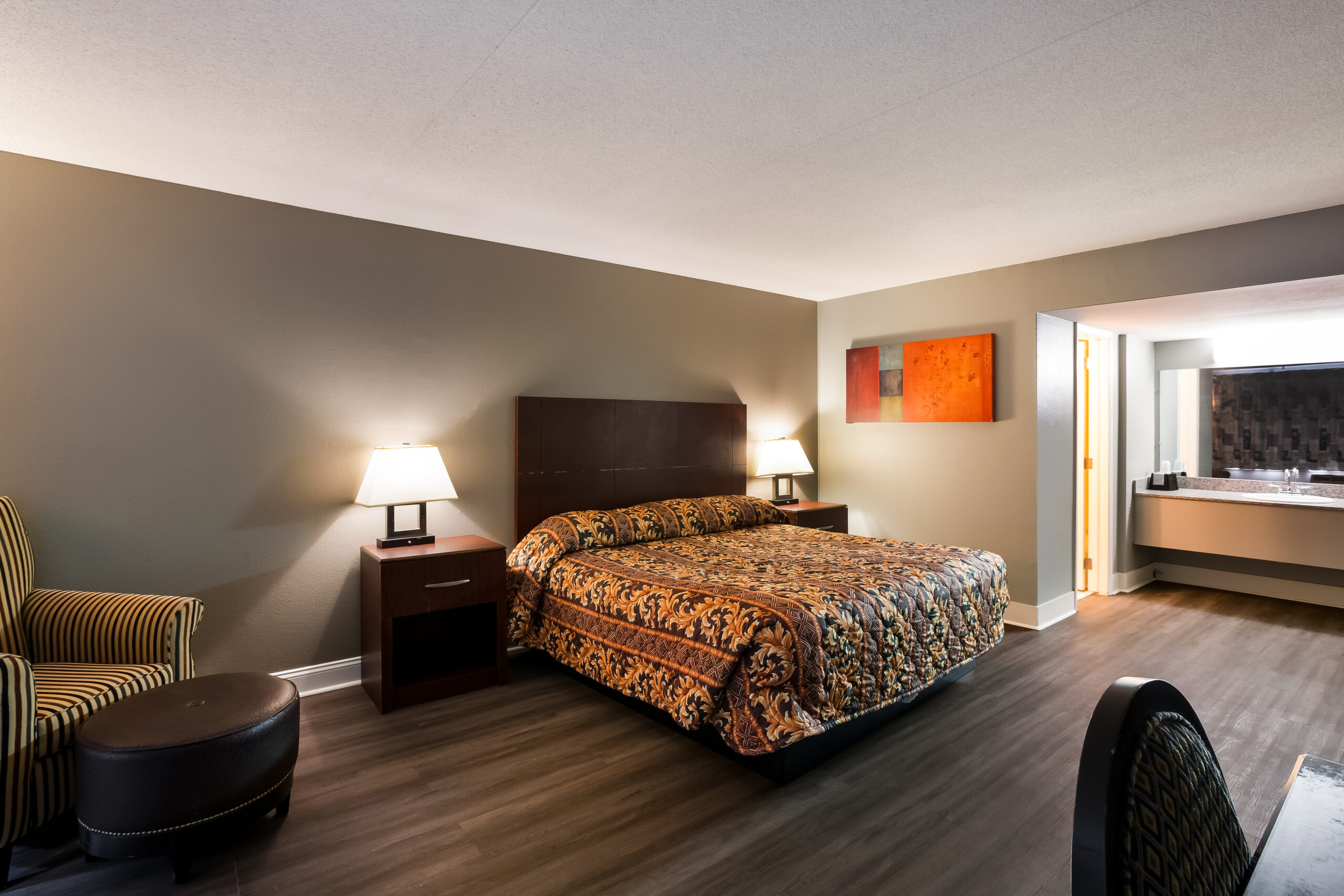 Hotel room with a king bed.