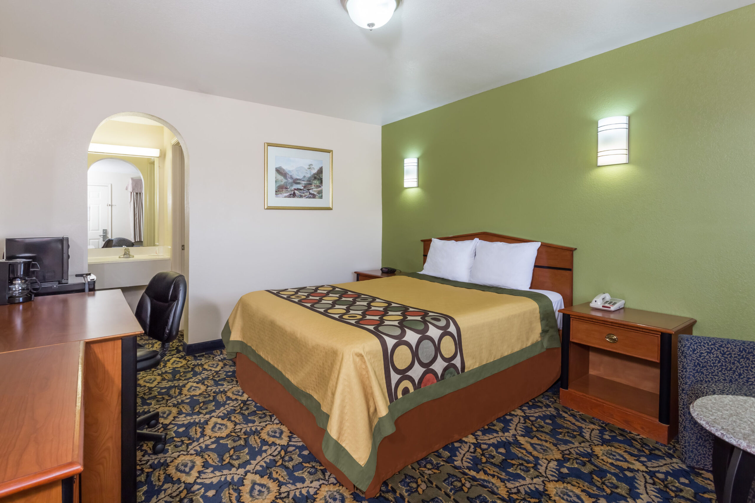 Hotel room with a double bed.