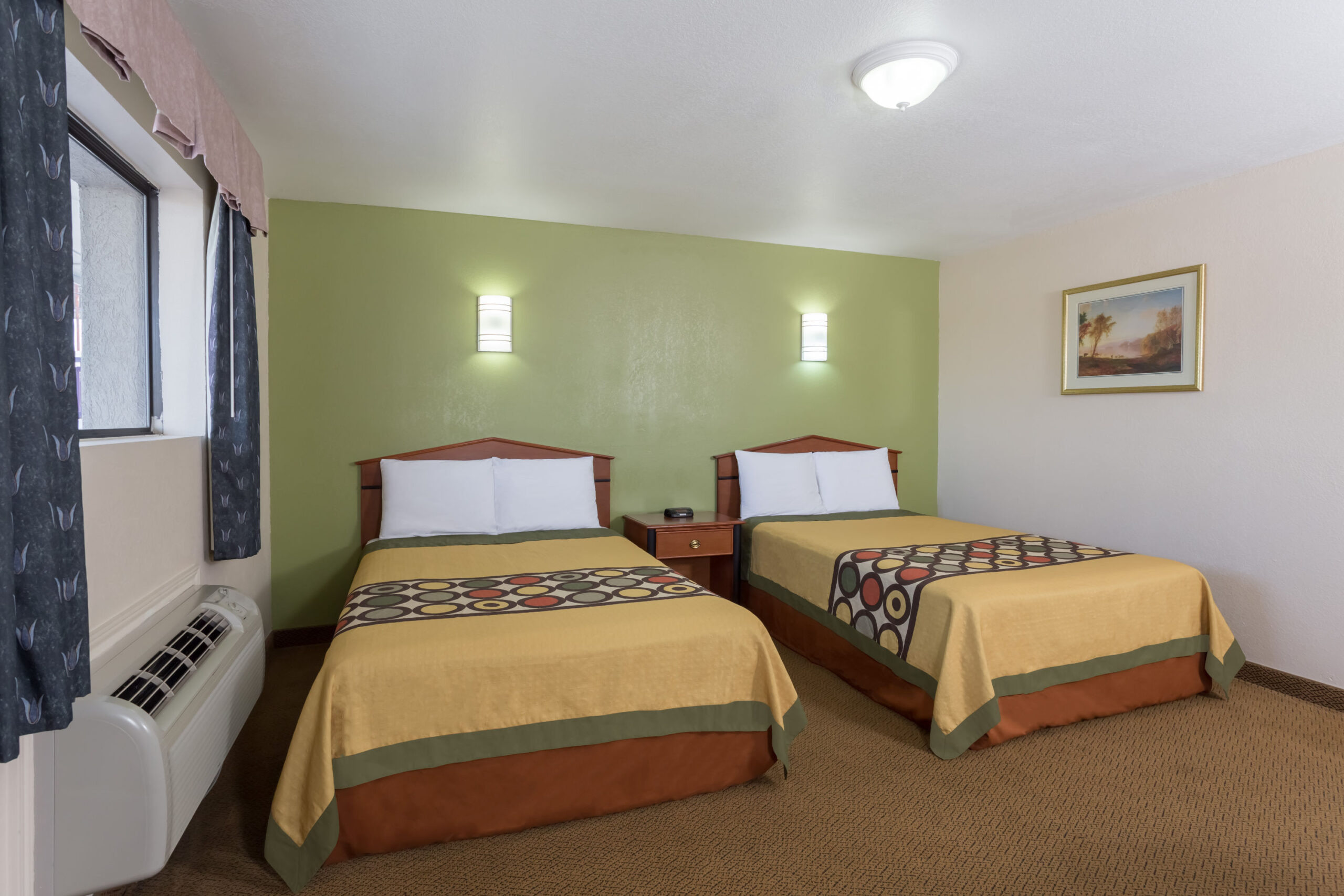 Hotel room with two beds.