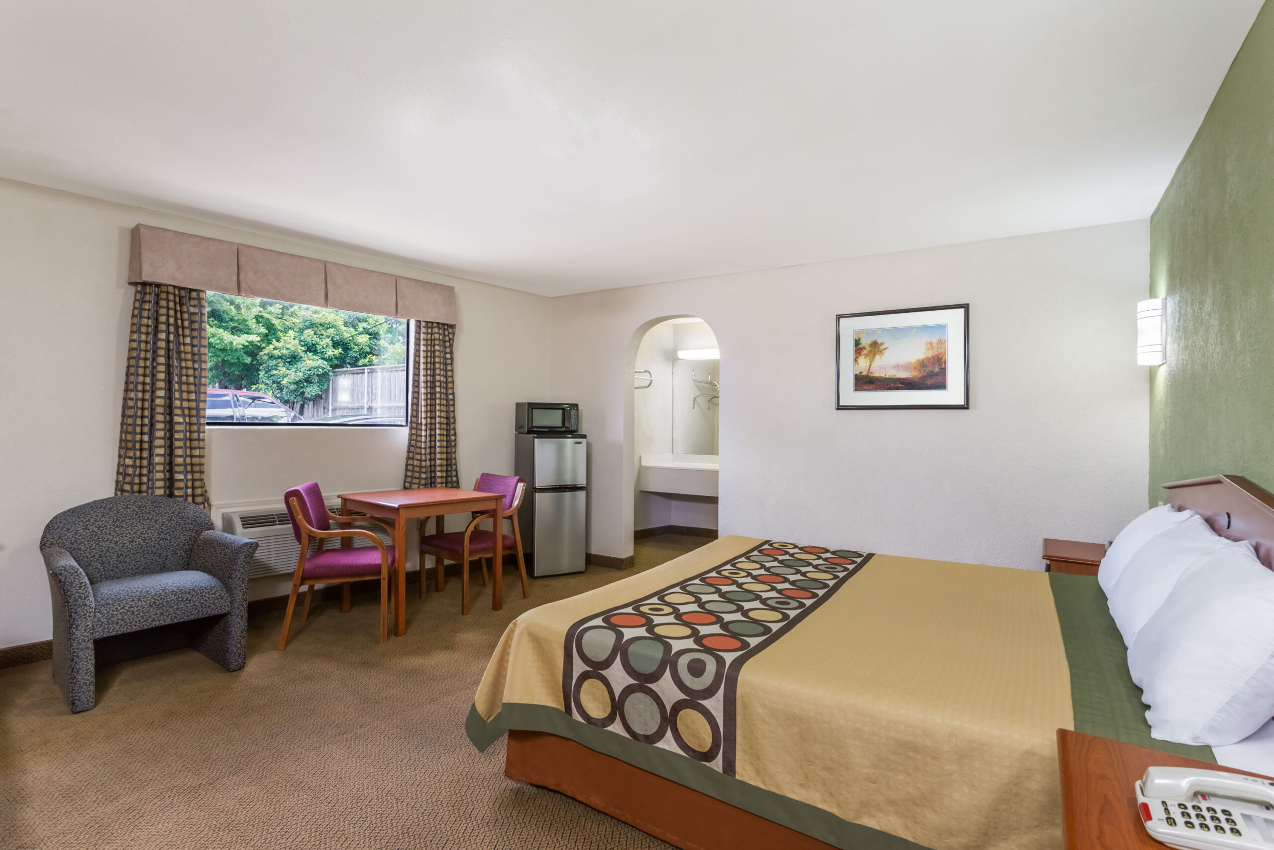 Hotel room with a double bed.