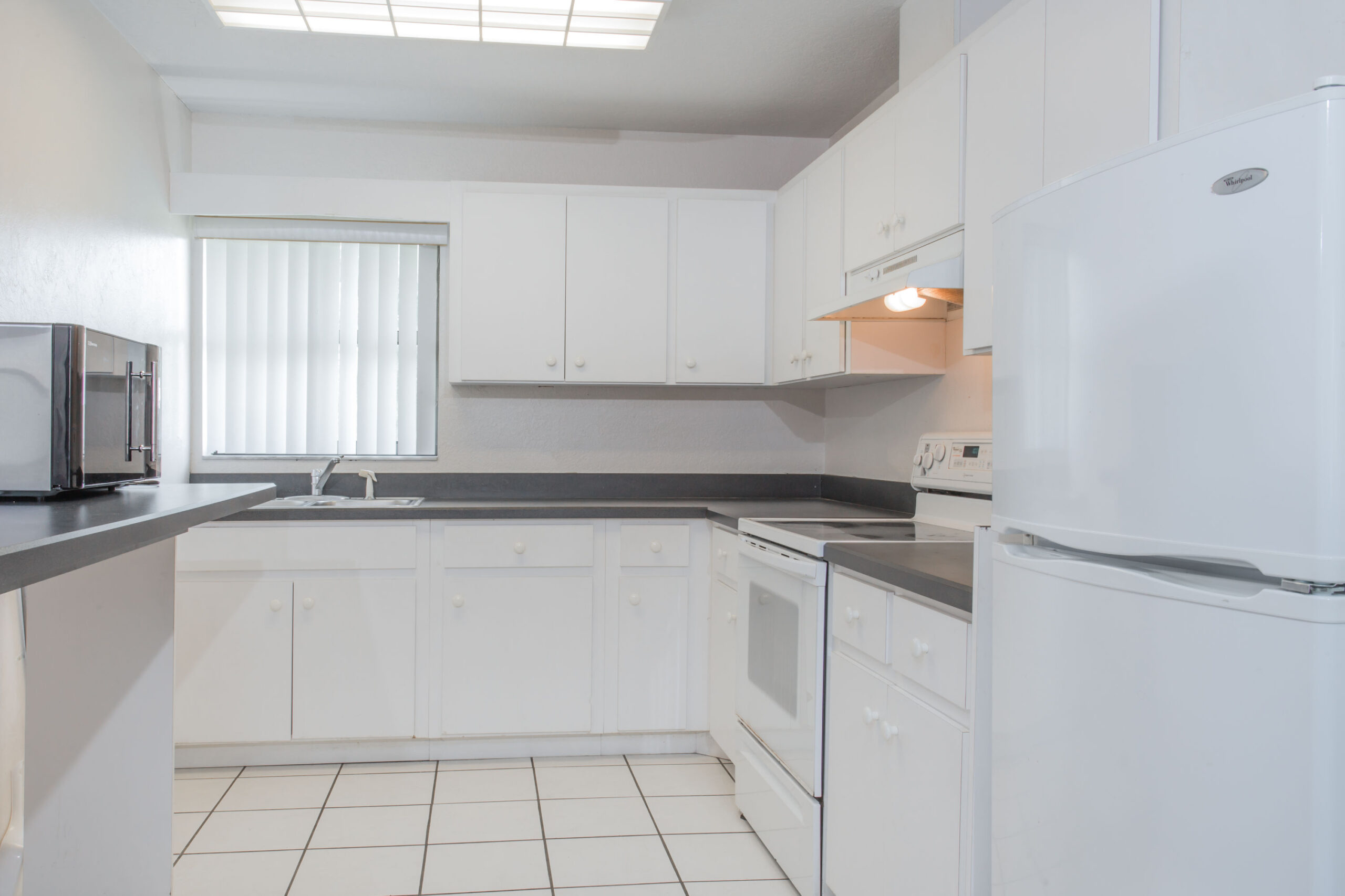 Hotel room kitchen area.