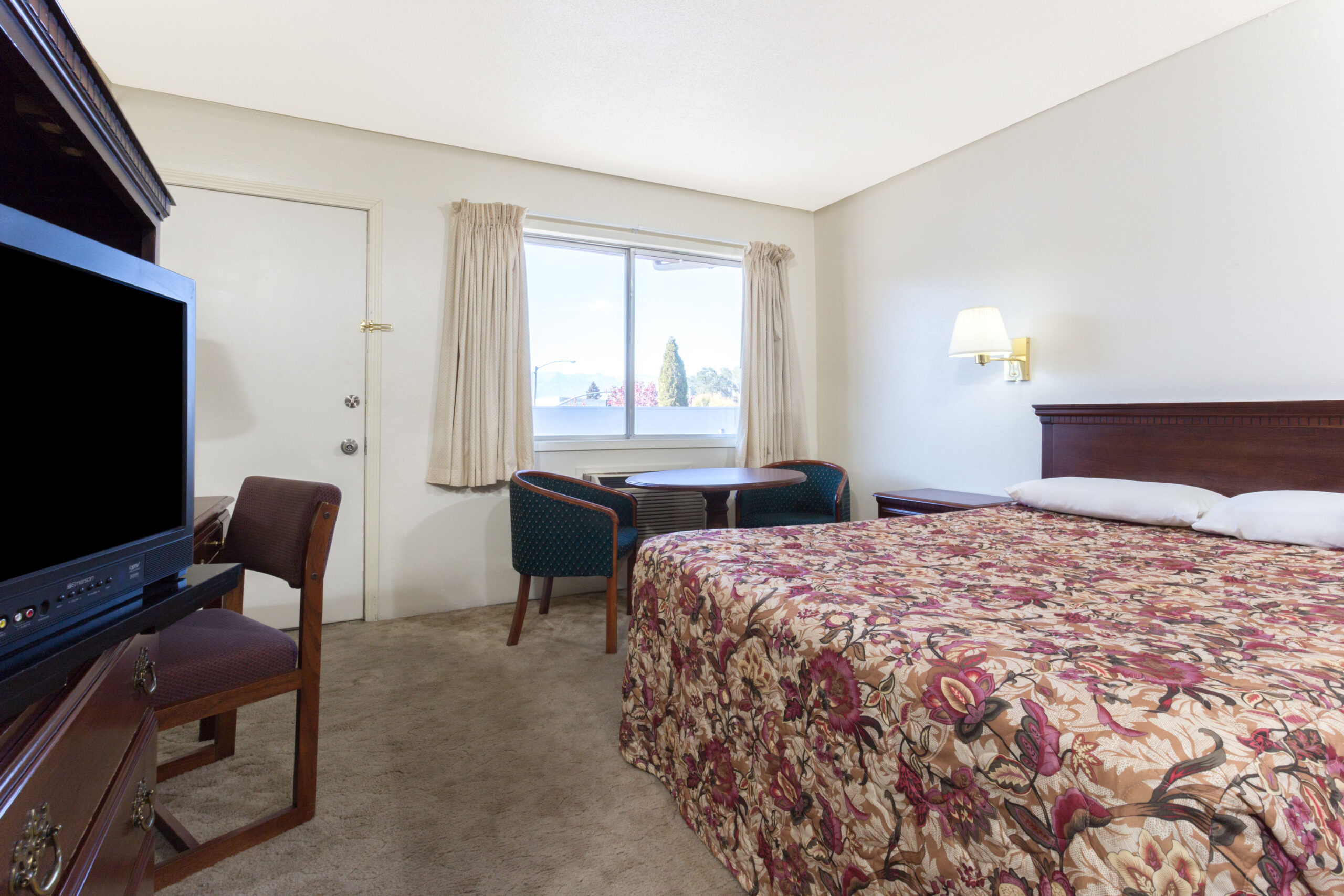 Hotel room with a double bed.