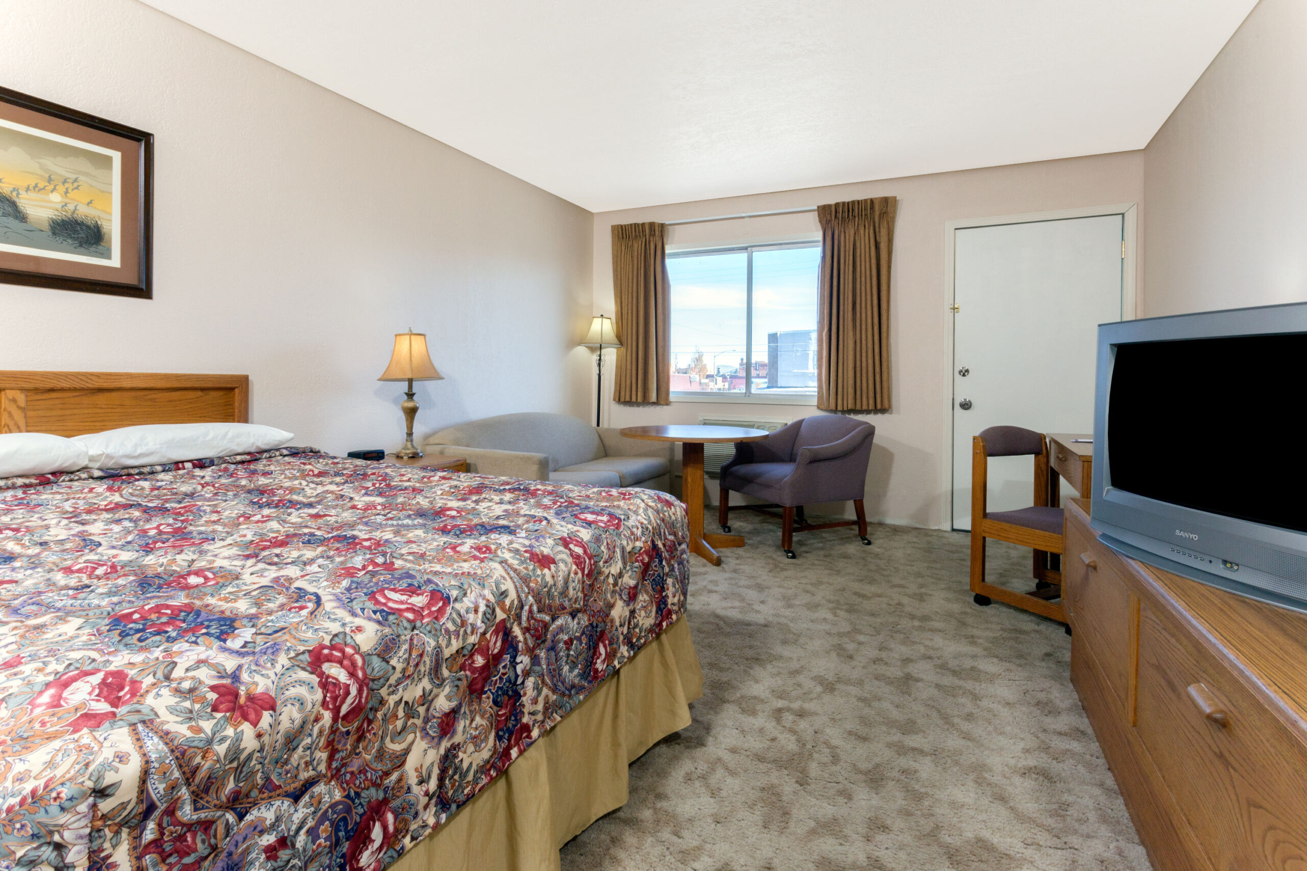Hotel room with a double bed.