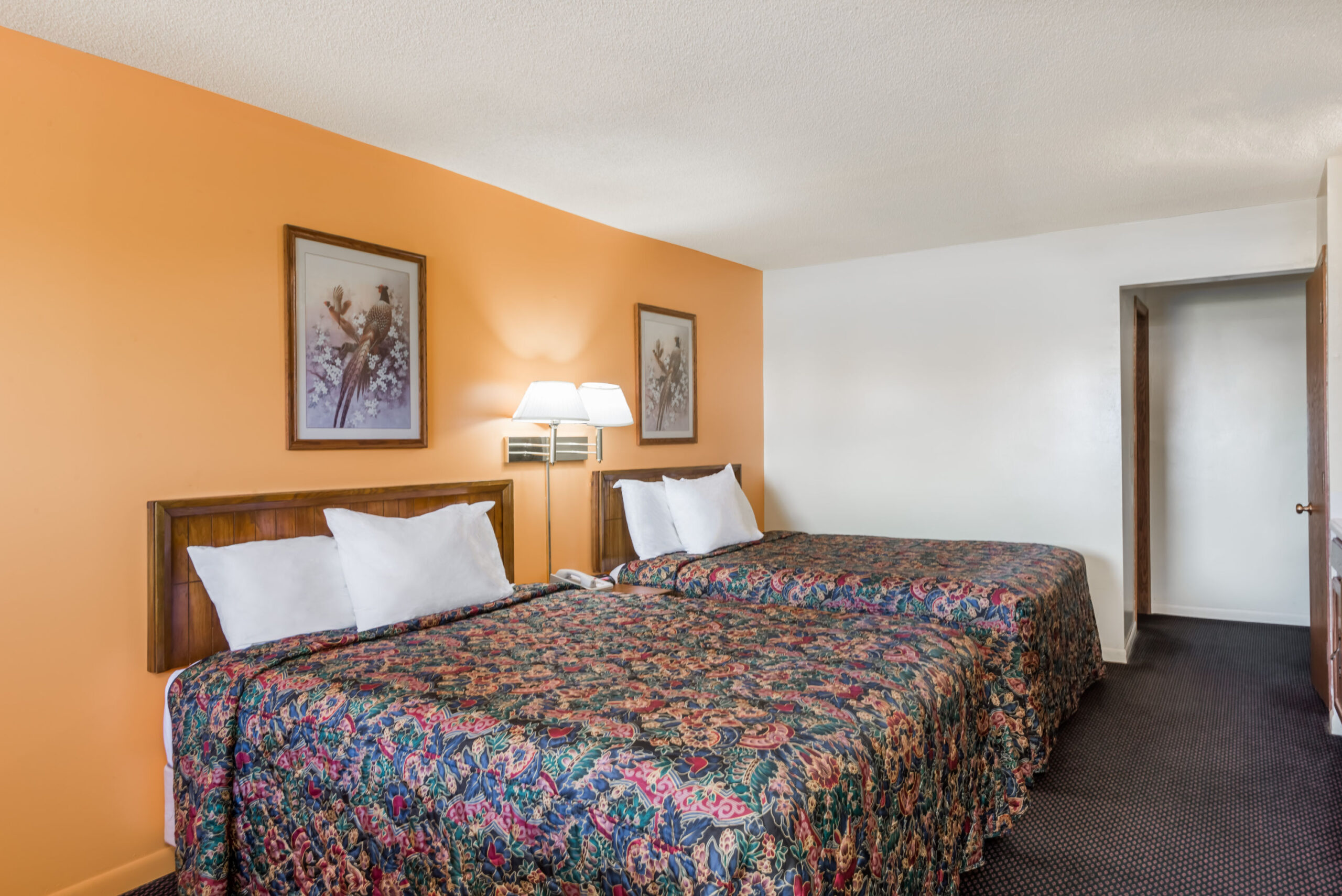 Hotel room with two double beds.