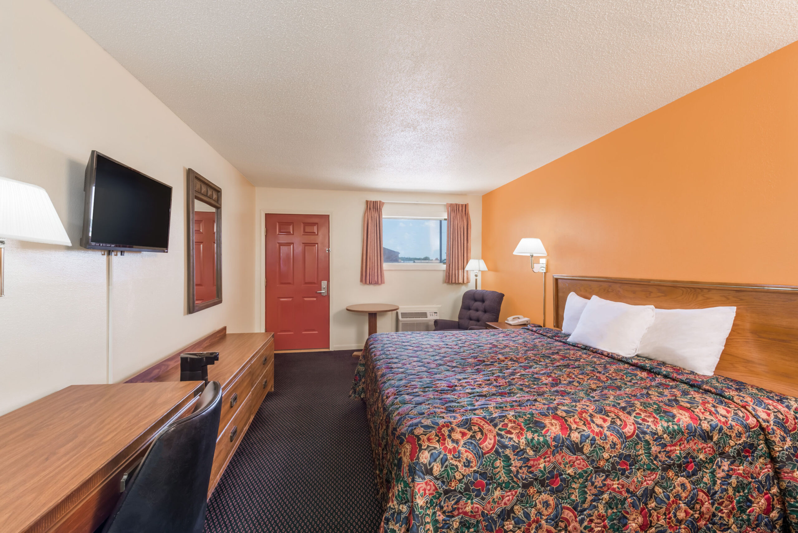 Hotel room with a double bed.