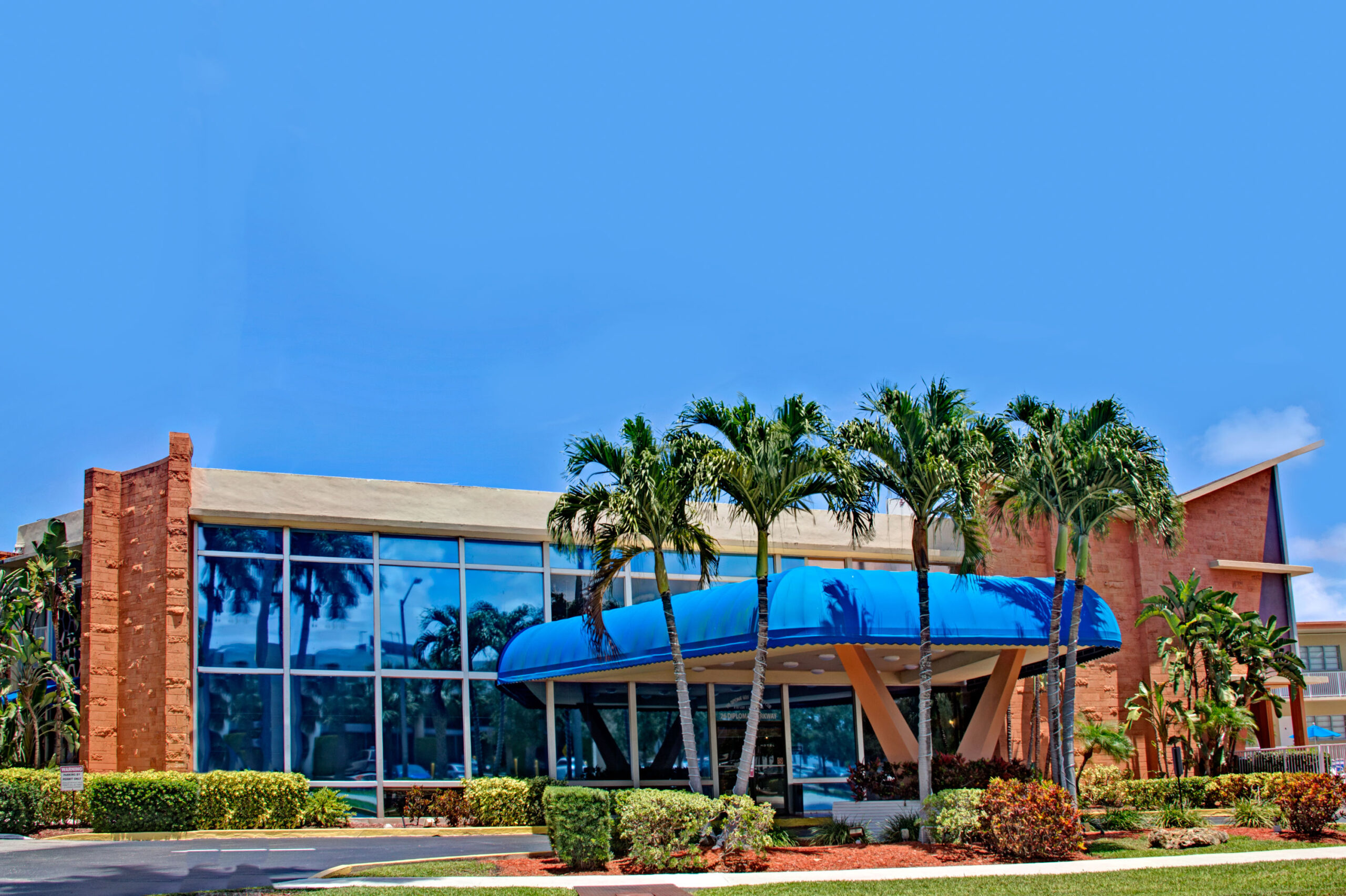 Hotel exterior in daylight.