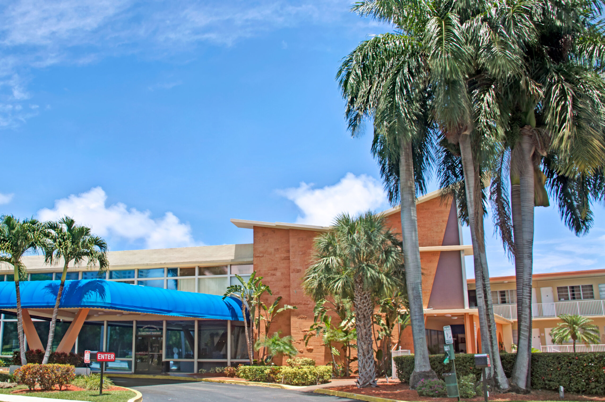 Hotel exterior in daylight.