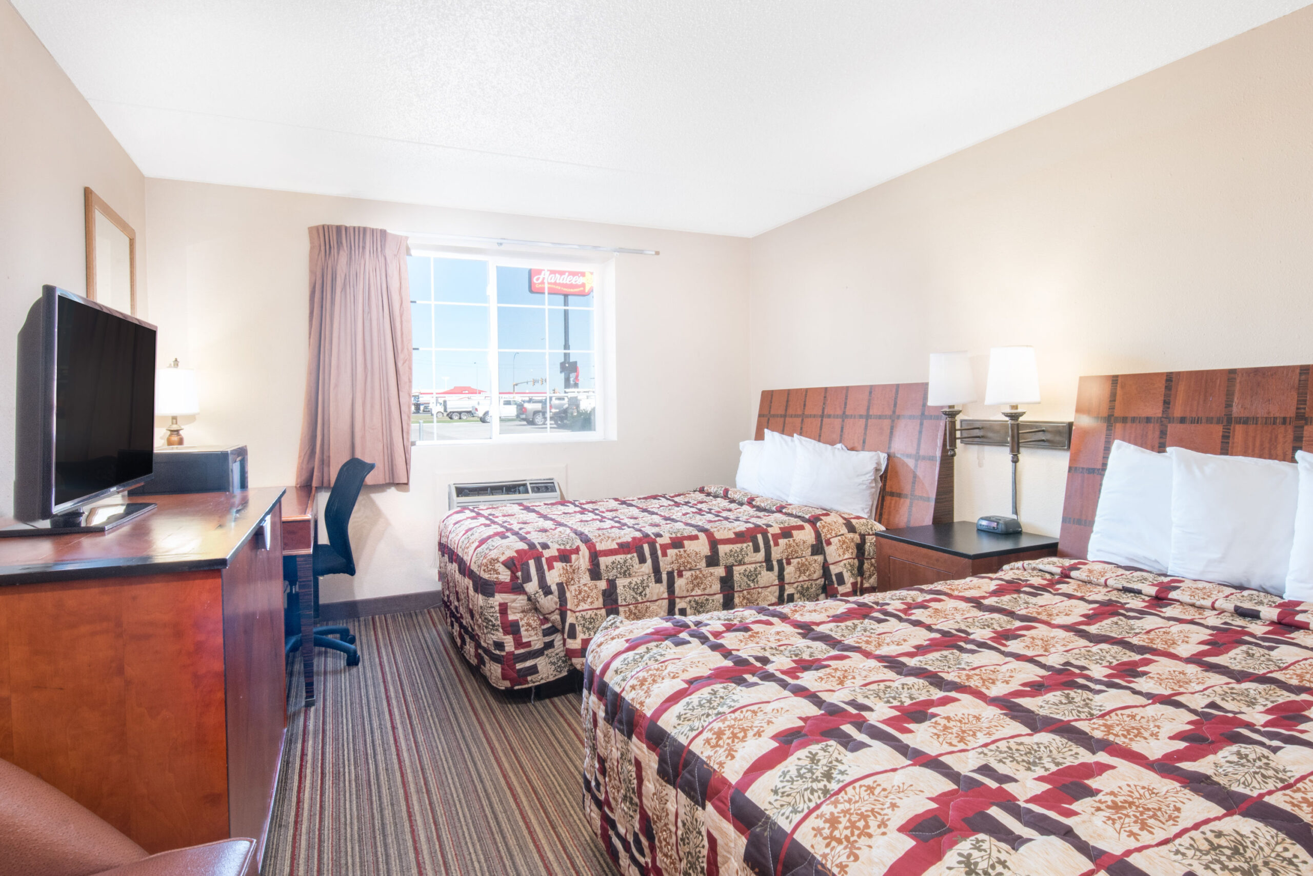 Hotel room with two beds.