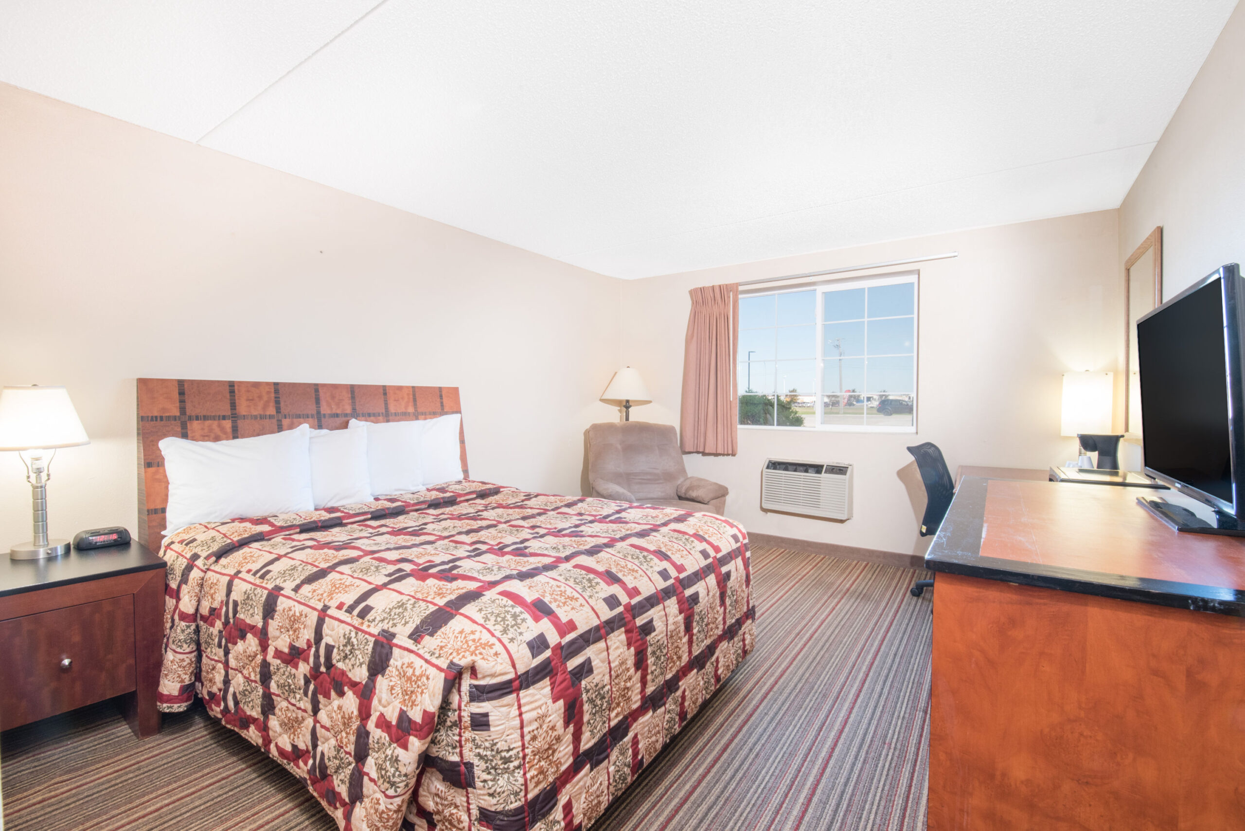 Hotel room with a double bed.