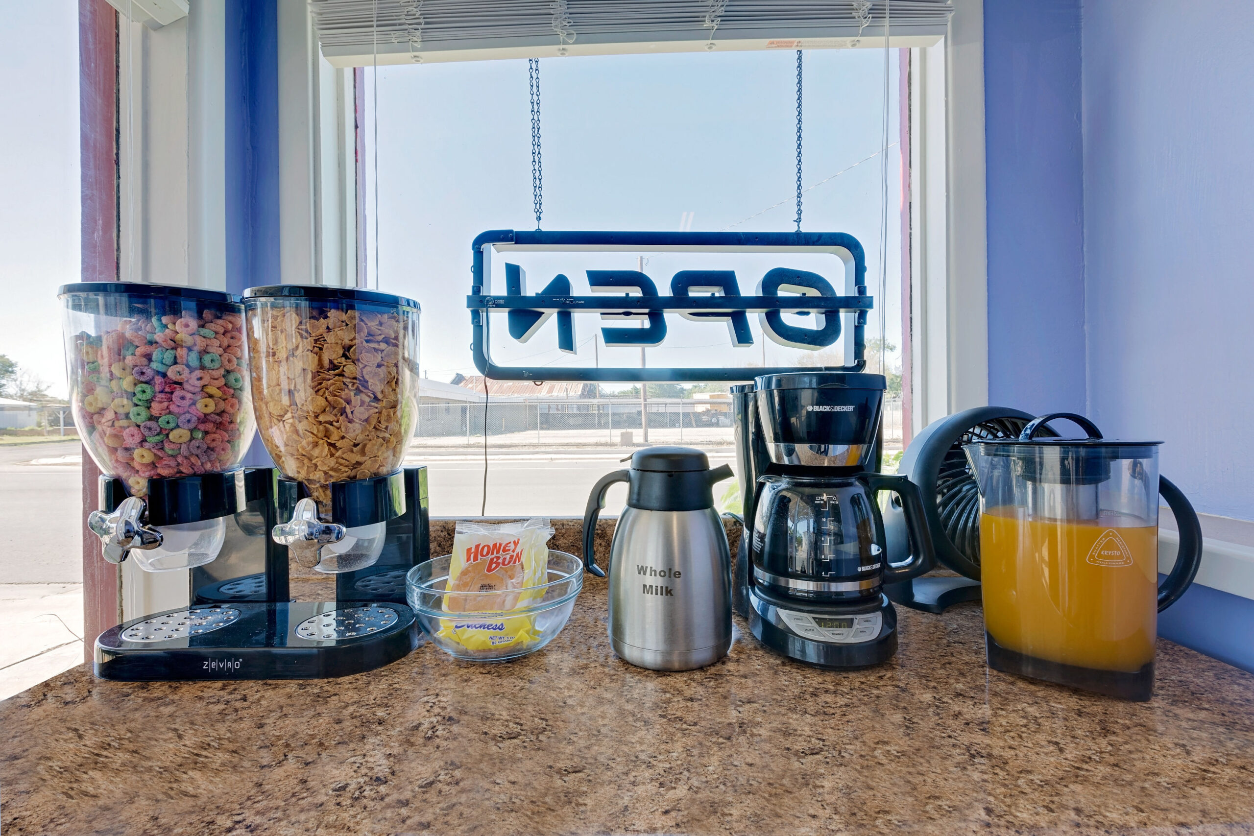 Breakfast area with various food items.