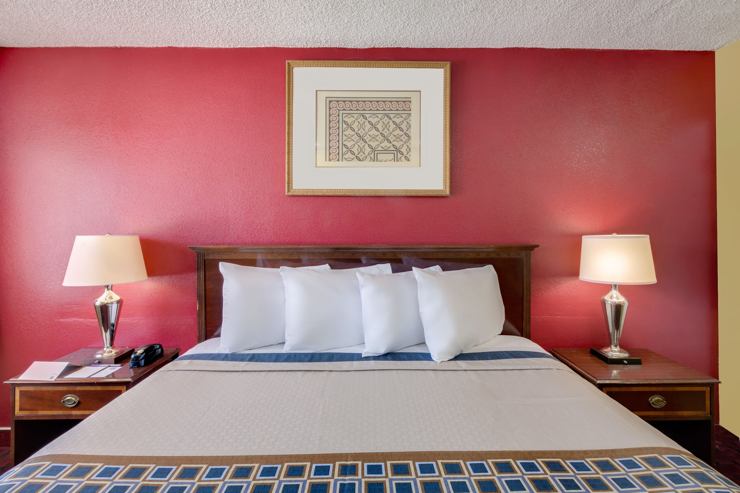Hotel room with a king bed.