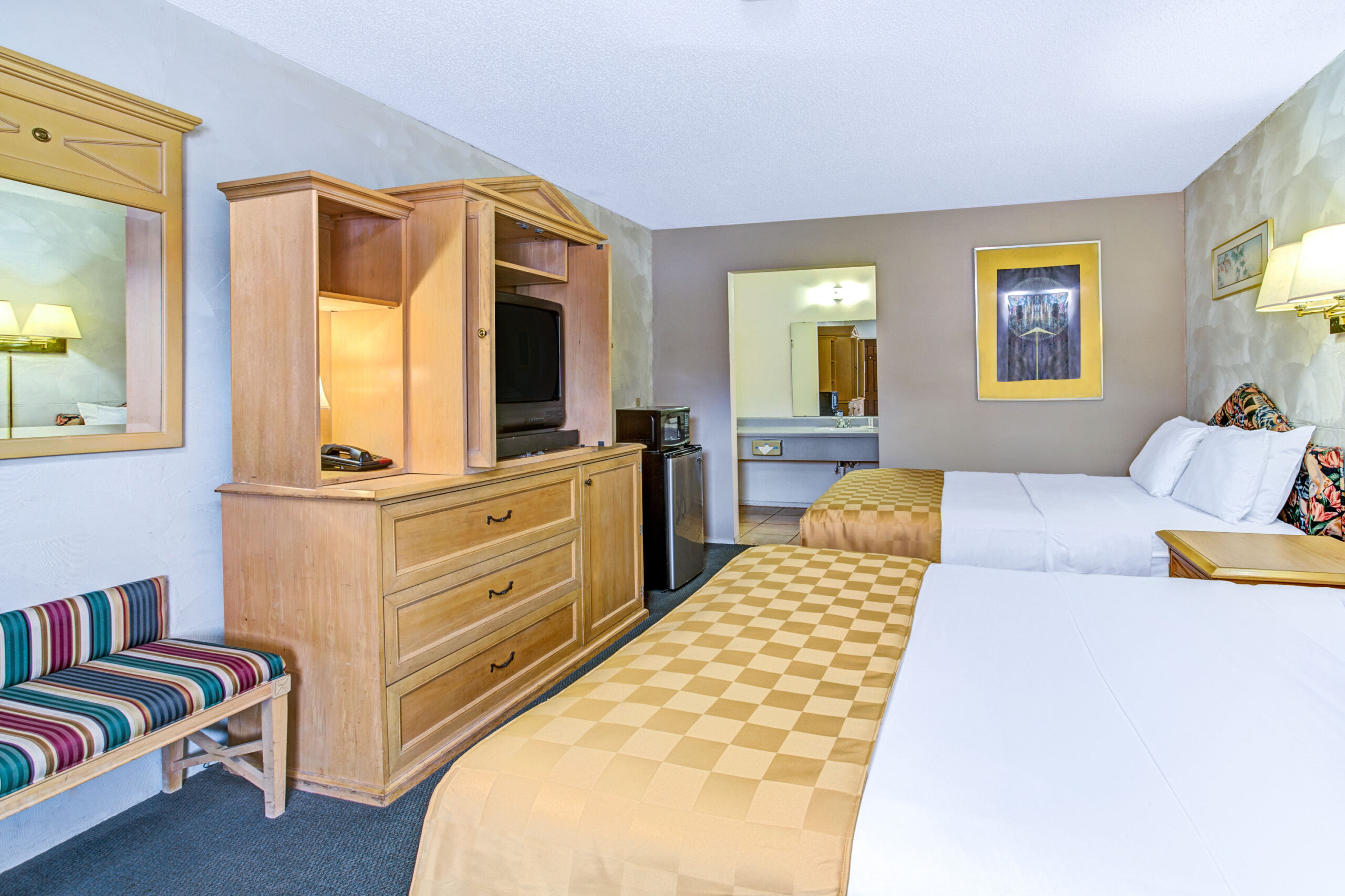 Hotel room with two double beds.