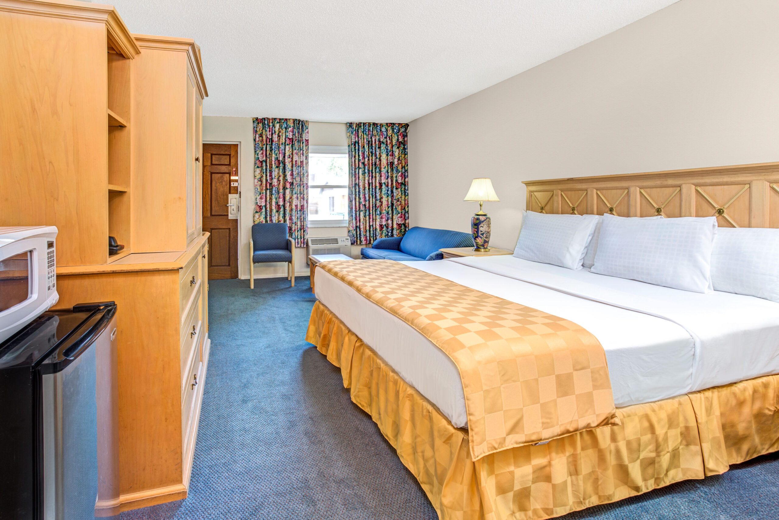 Hotel room with two double beds.