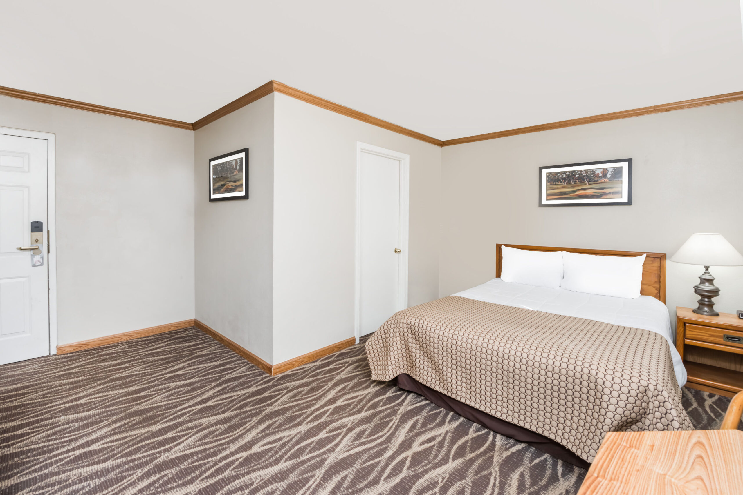 Hotel room with a double bed.
