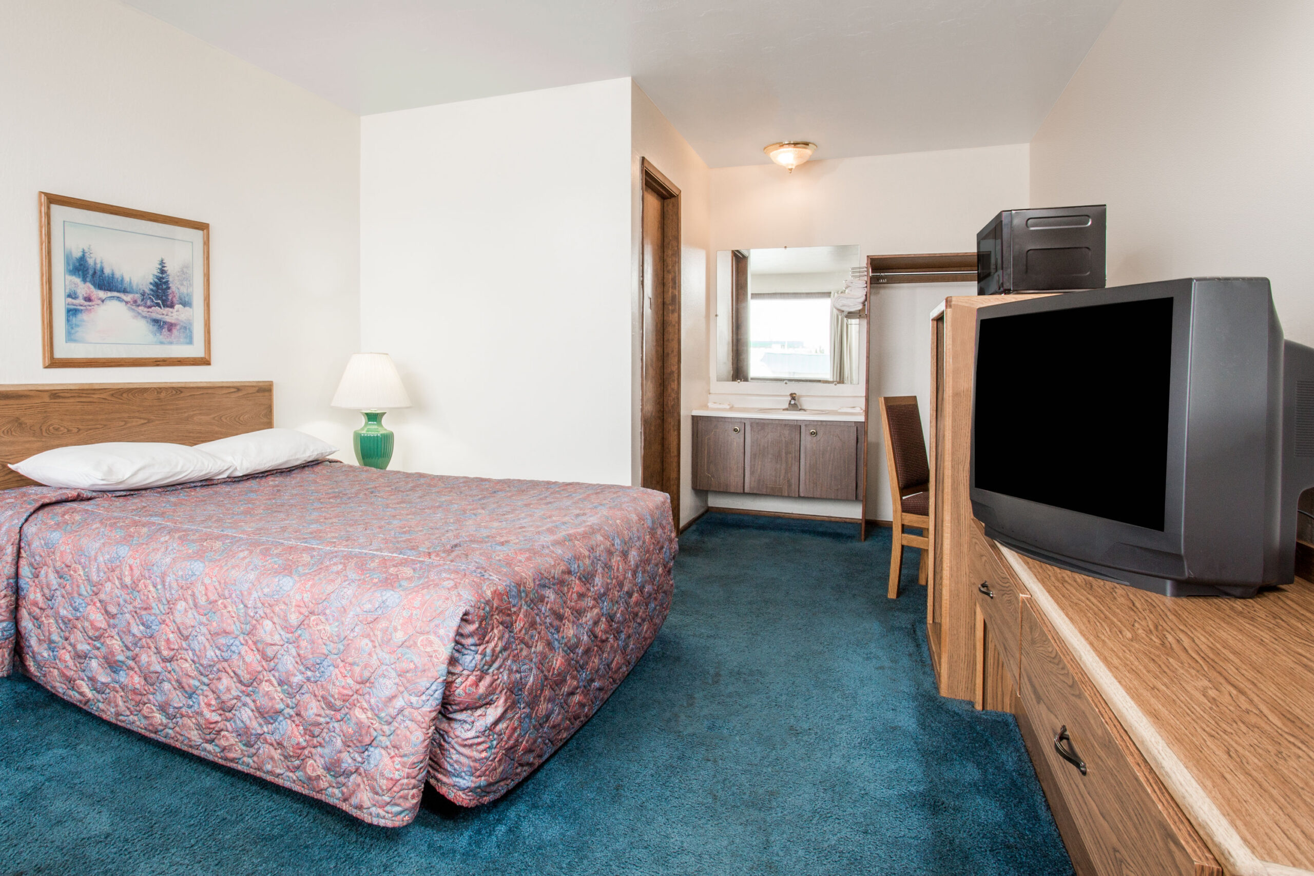 Hotel room with a double bed.