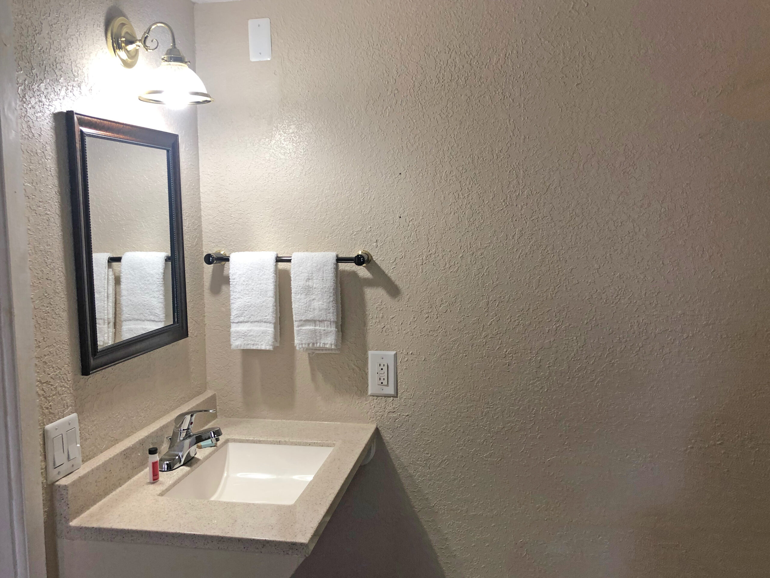 Hotel room bathroom.