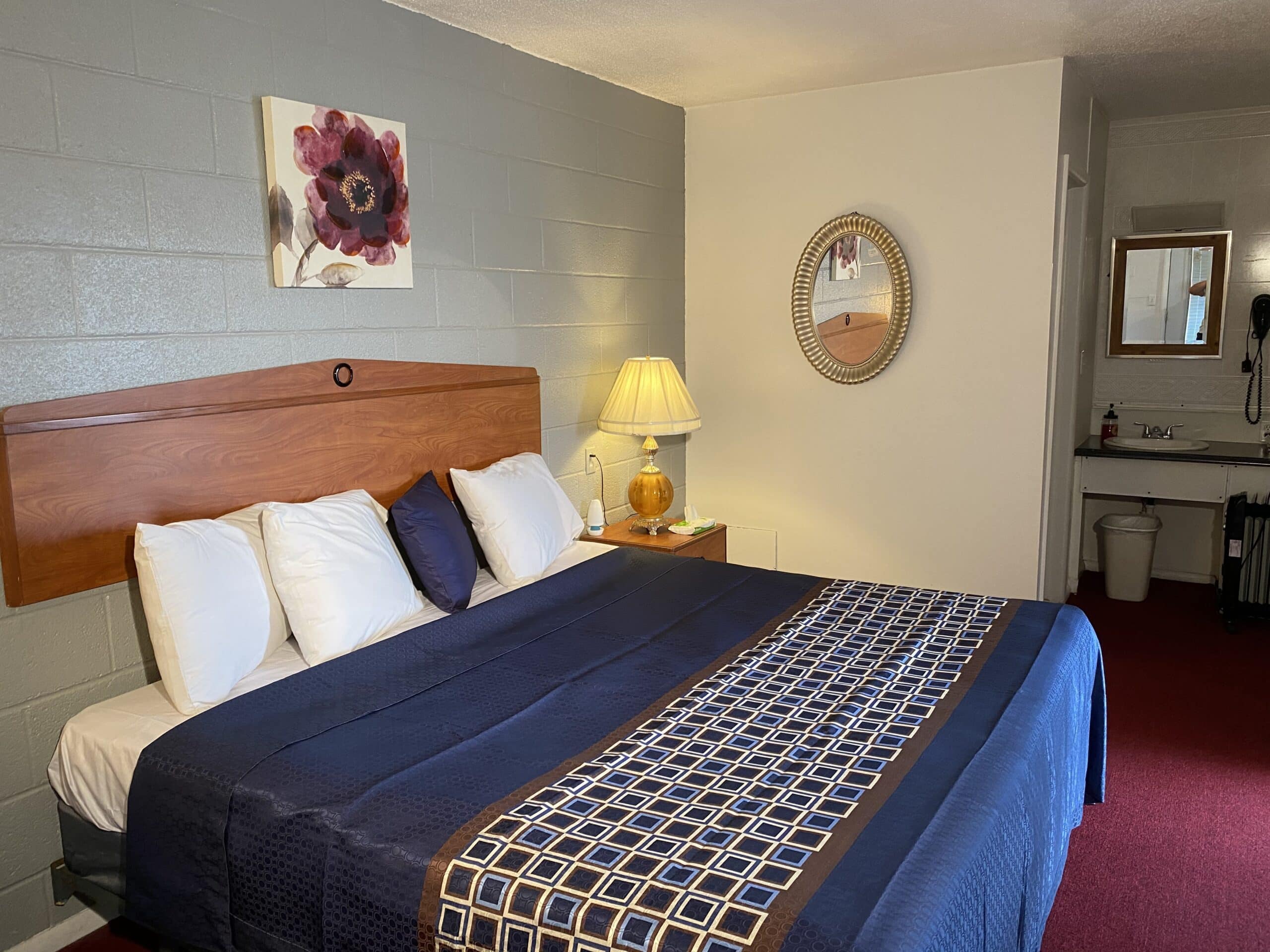 Hotel room with a king bed.